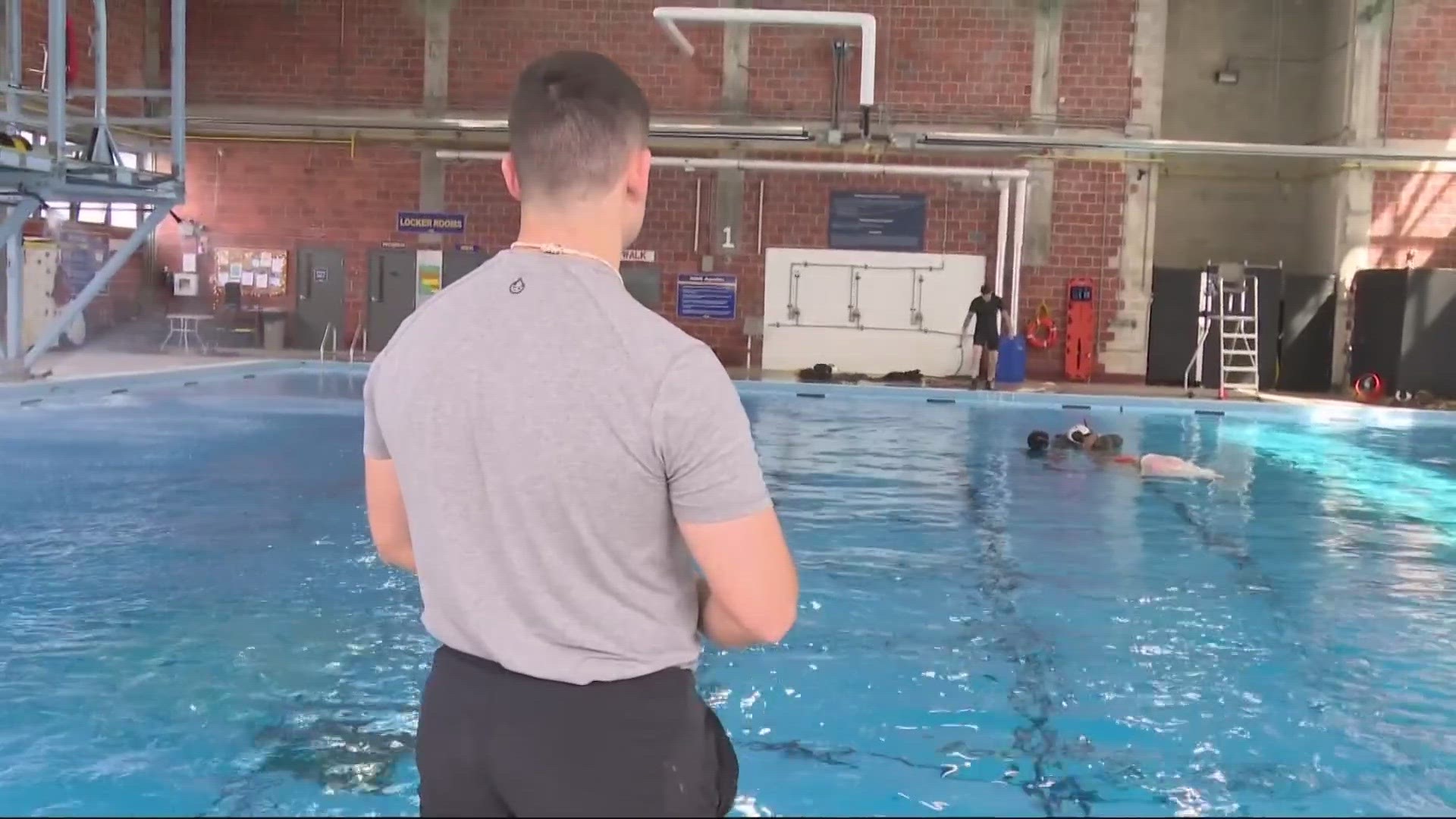 Long before anyone needs to be rescued in the open water, Operations Specialist 2nd class Michael Parra trains rescue swimmers in the pool at NAS Jax.
