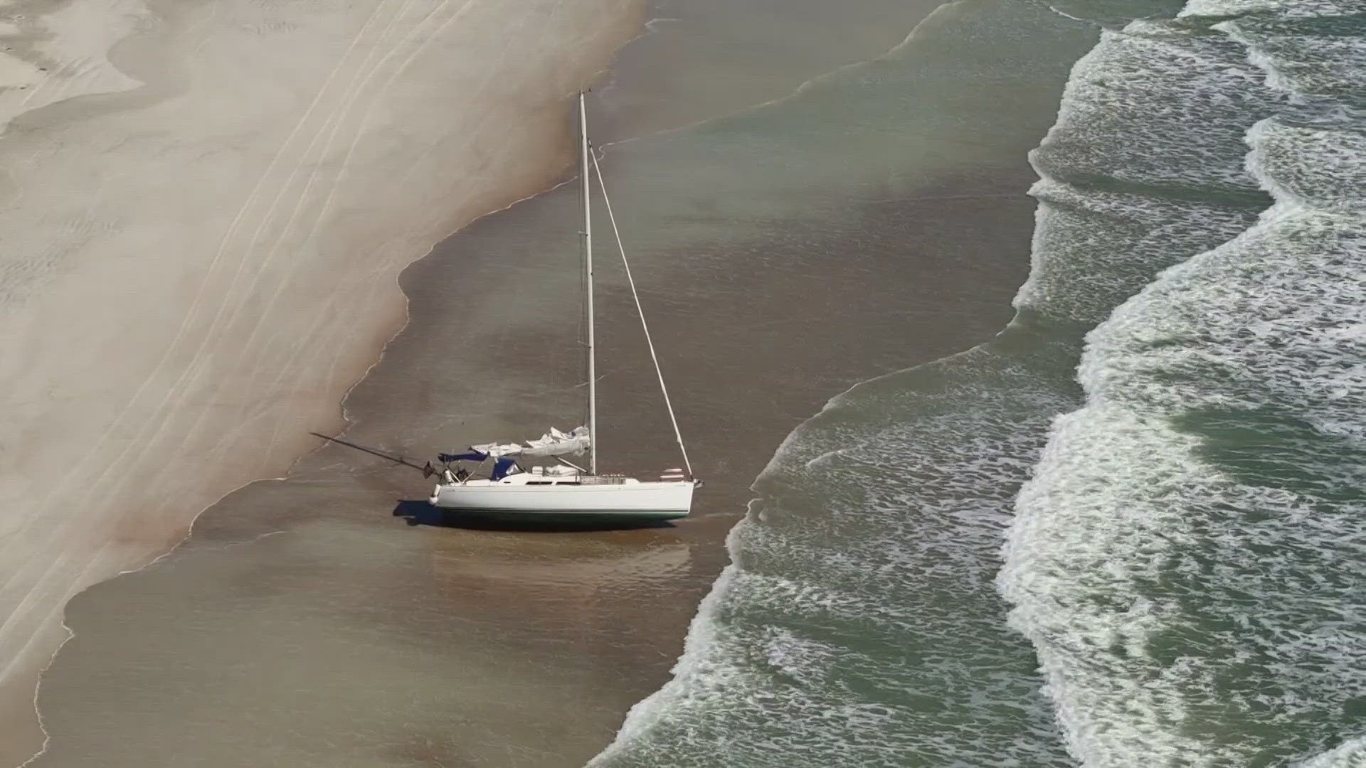 The sailboat owner has seven days to remove it from the sand before there are any penalties.
