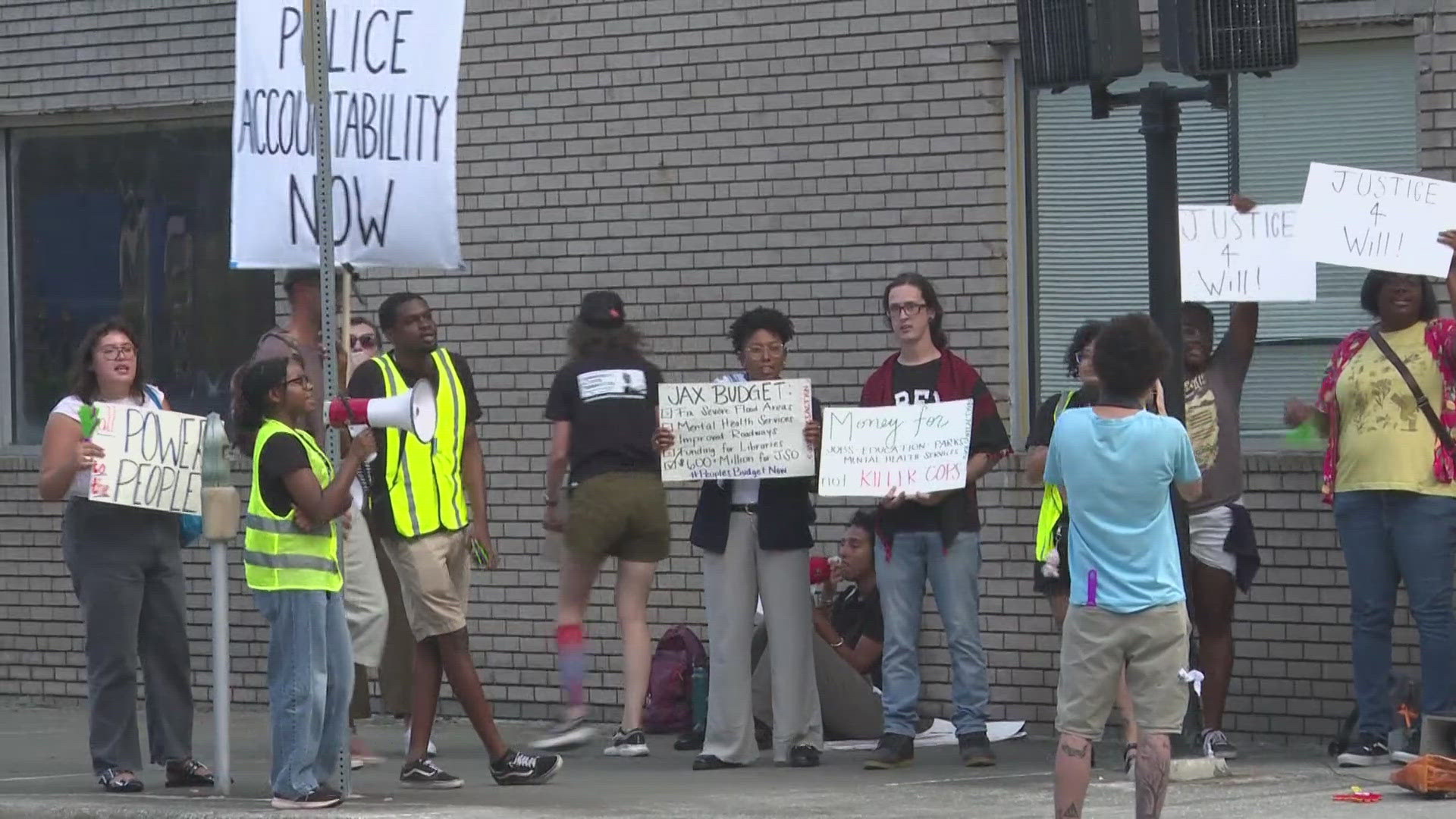 Tensions rose as Jacksonville Sheriff T.K. Waters faced criticism from community advocates outside his final town hall meeting of the year. 