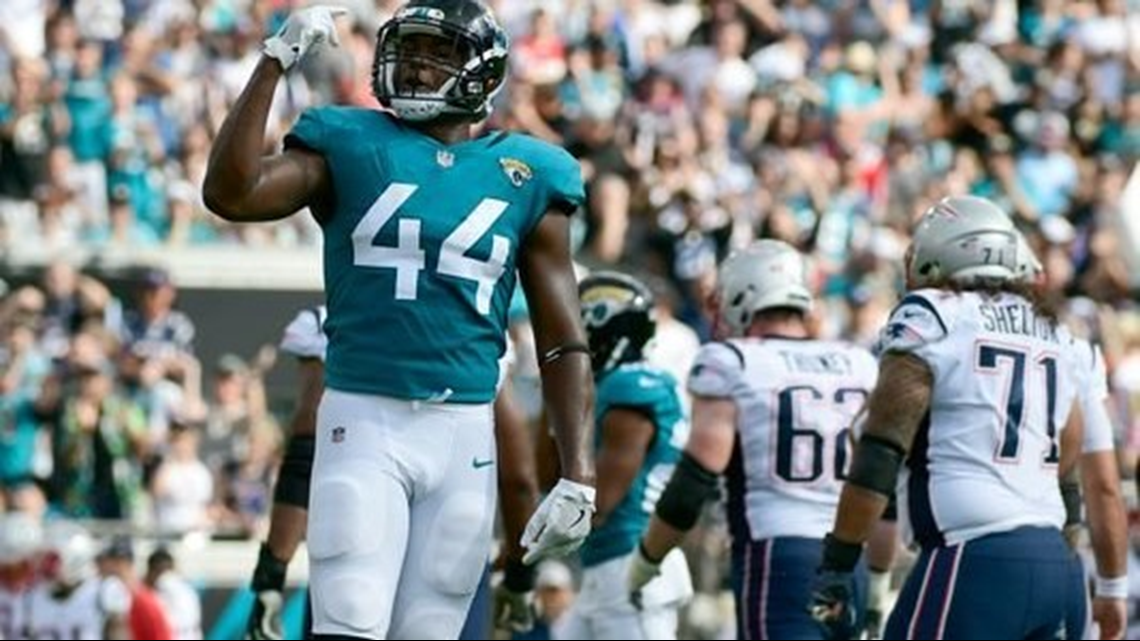 Jacksonville, FL, USA. 16th Sep, 2018. Jacksonville Jaguars defensive end  Dante Fowler (56) runs unto the field before the start 1st half NFL  football game between the New England Patriots and the