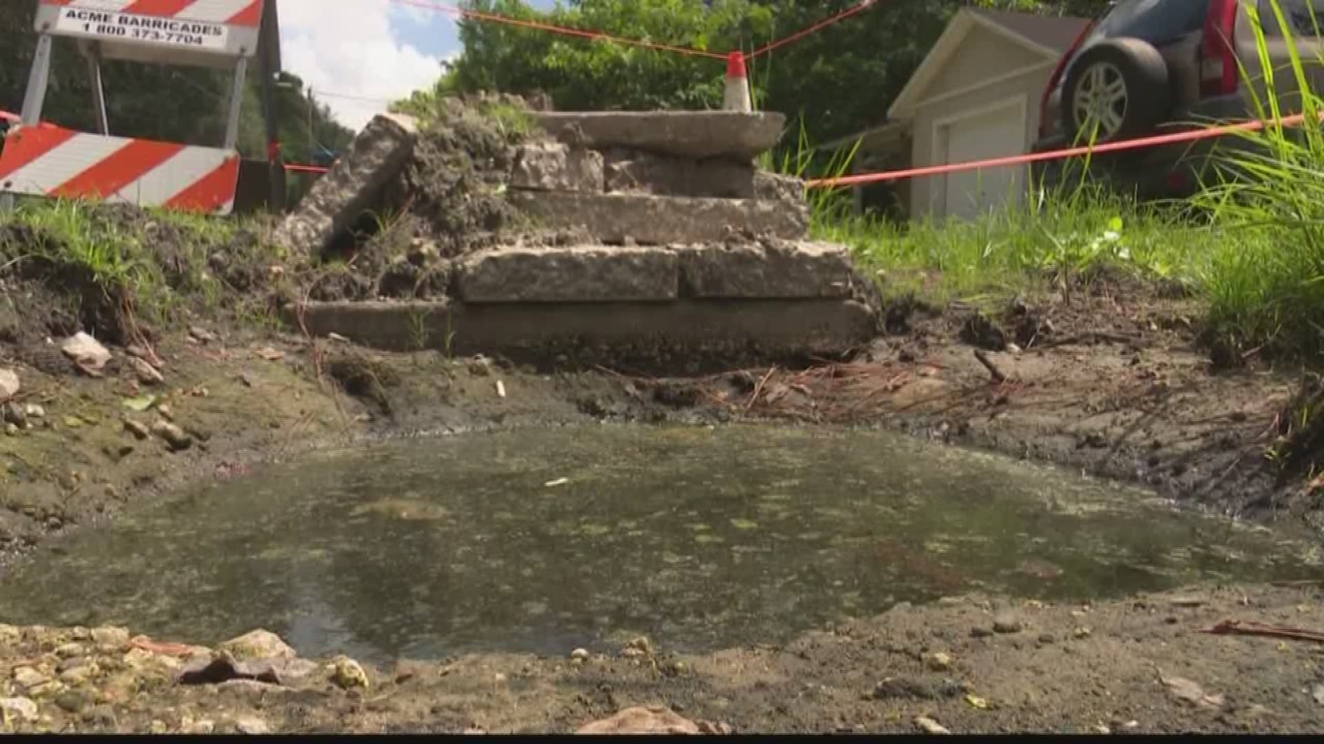 A Jacksonville woman is upset over a hole filled with sewer-water outside her home.