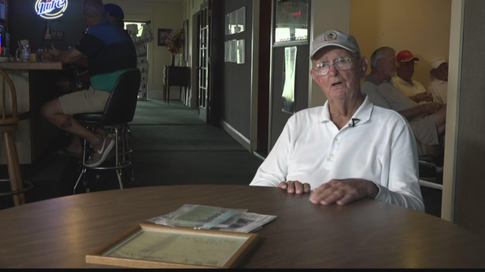 Gus Elison, a 92-year-old Navy veteran, probably plays more golf than you. He's also really good at getting a hole in one, based on his track record.