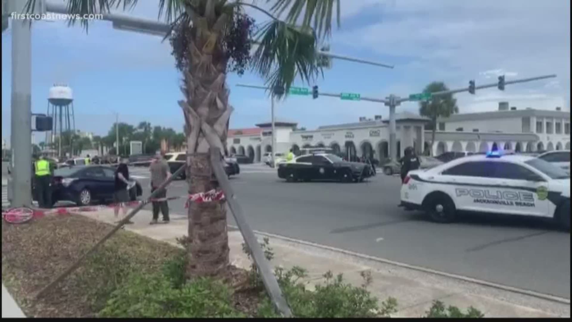 A woman is suffering from serious injuries after getting pinned between a car and a pole during a crash in Jax Beach on Saturday, according to first responders.