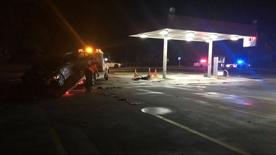 Vehicle catches fire after driving into Westside gas station pump