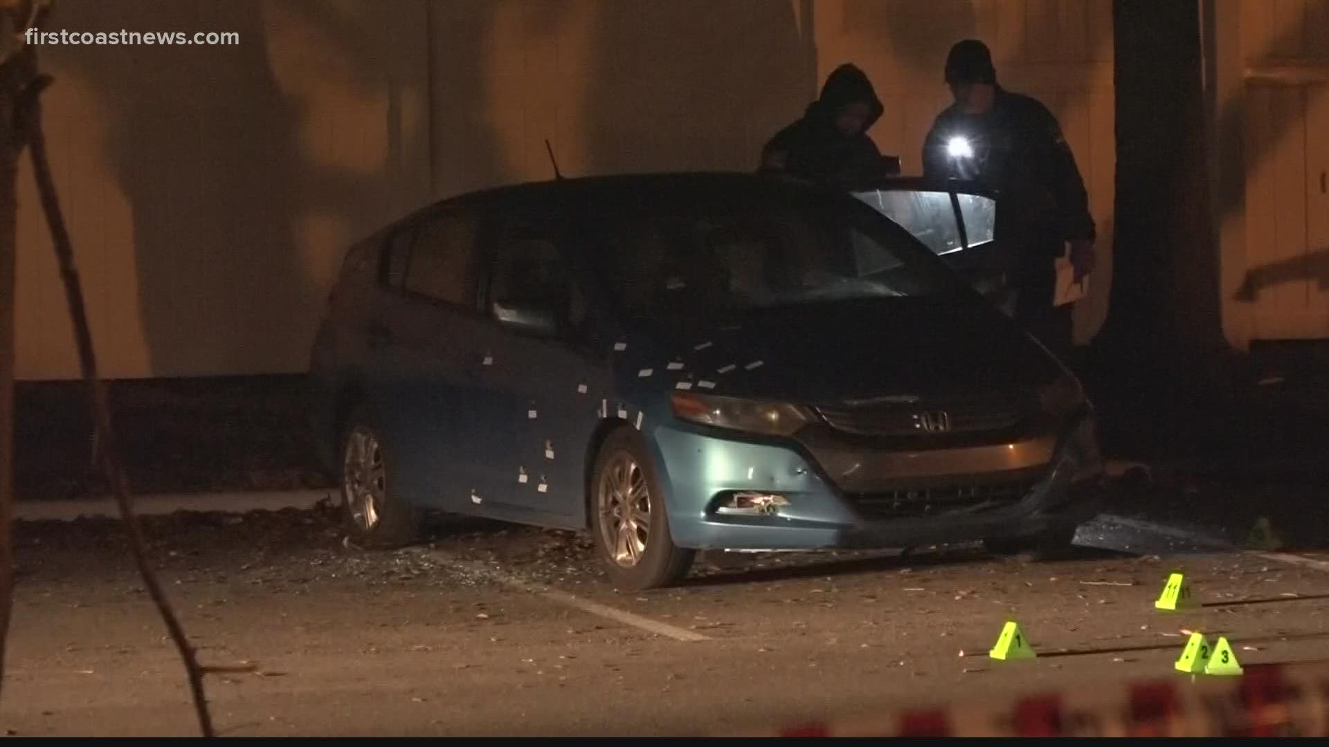 The victim, a 19-year-old woman, told police she was sitting in her parked car possibly with a friend when a gunman fired a dozen rounds at the car.