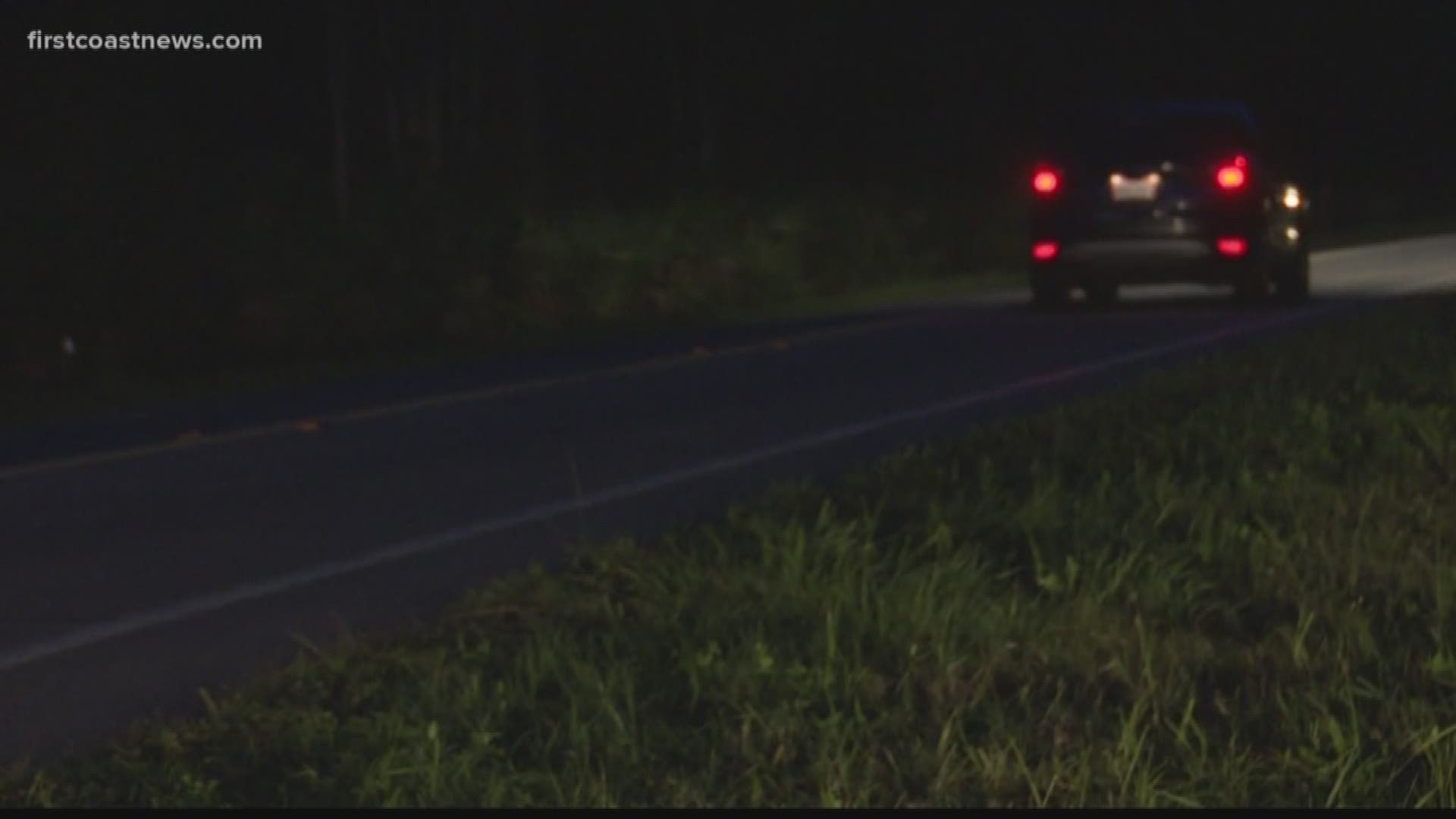 Deputies said a dark-colored mid-size sedan driven by a man with an orange shirt hit bicyclists traveling along Racetrack Road near Bartram Springs Parkway.