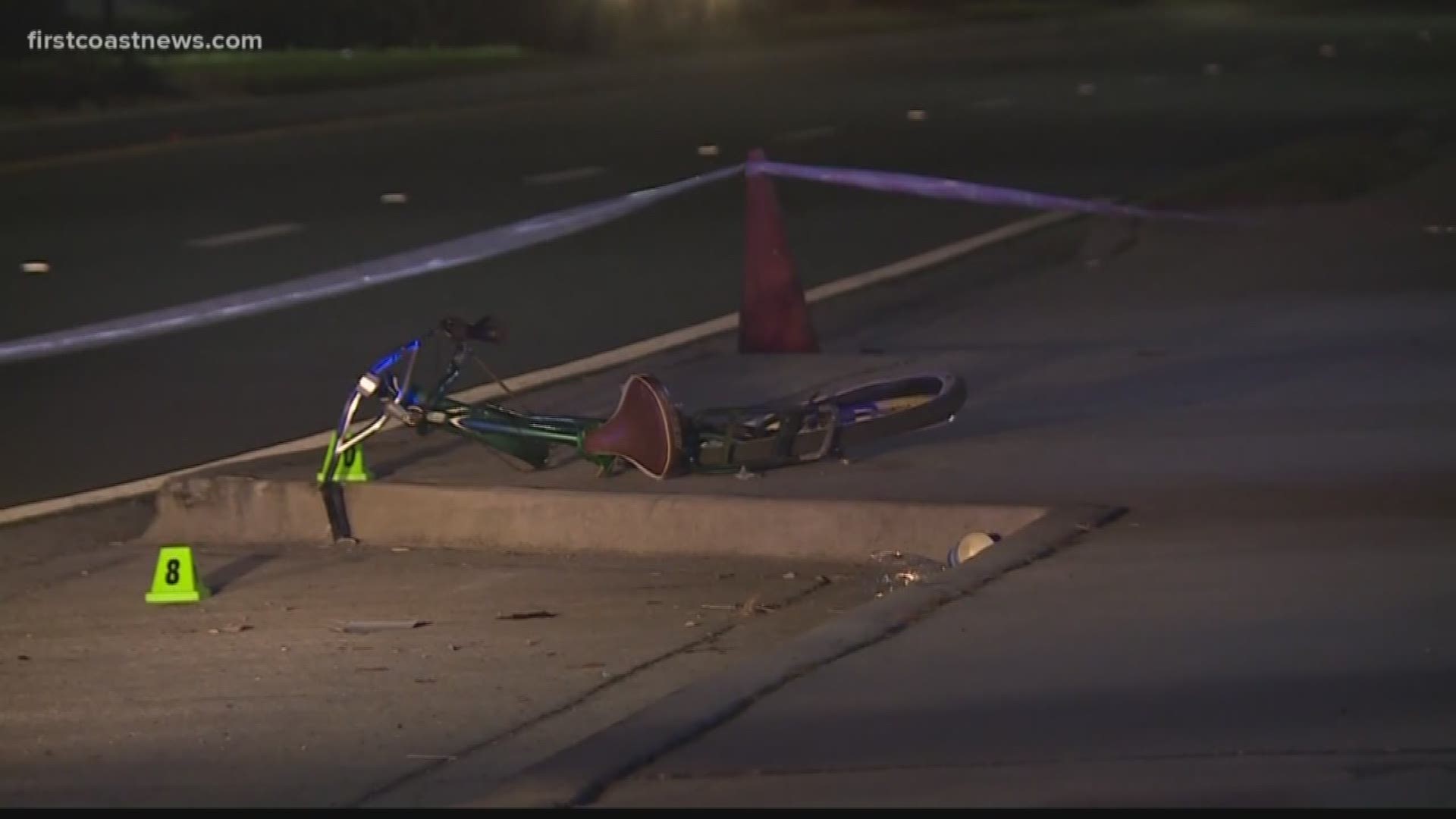 A driver is charged with fleeing a scene after a crash in Atlantic Beach left a bicyclist with life-threatening injuries.