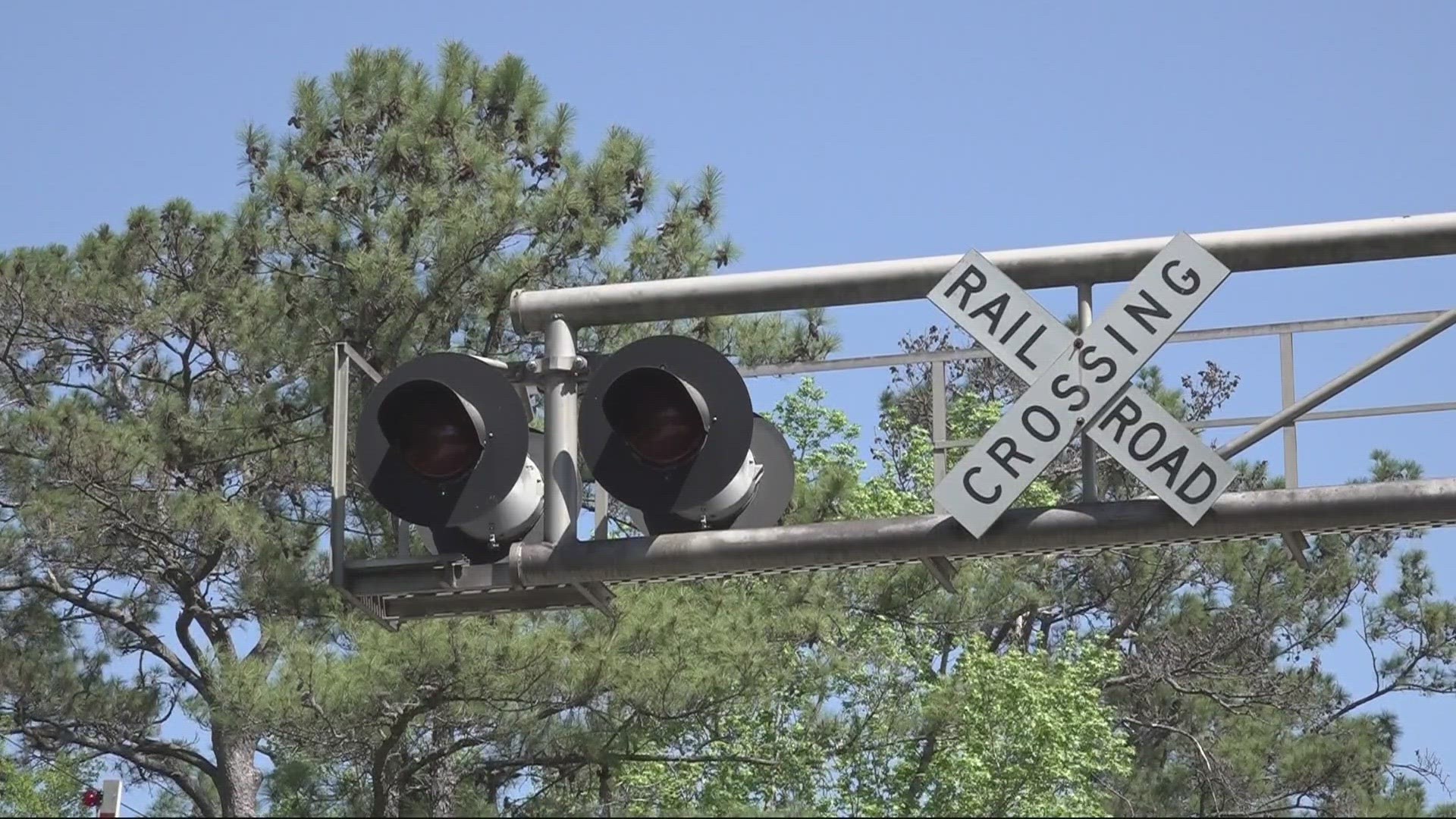 People who live in Dinsmore Community wait for trains for hours