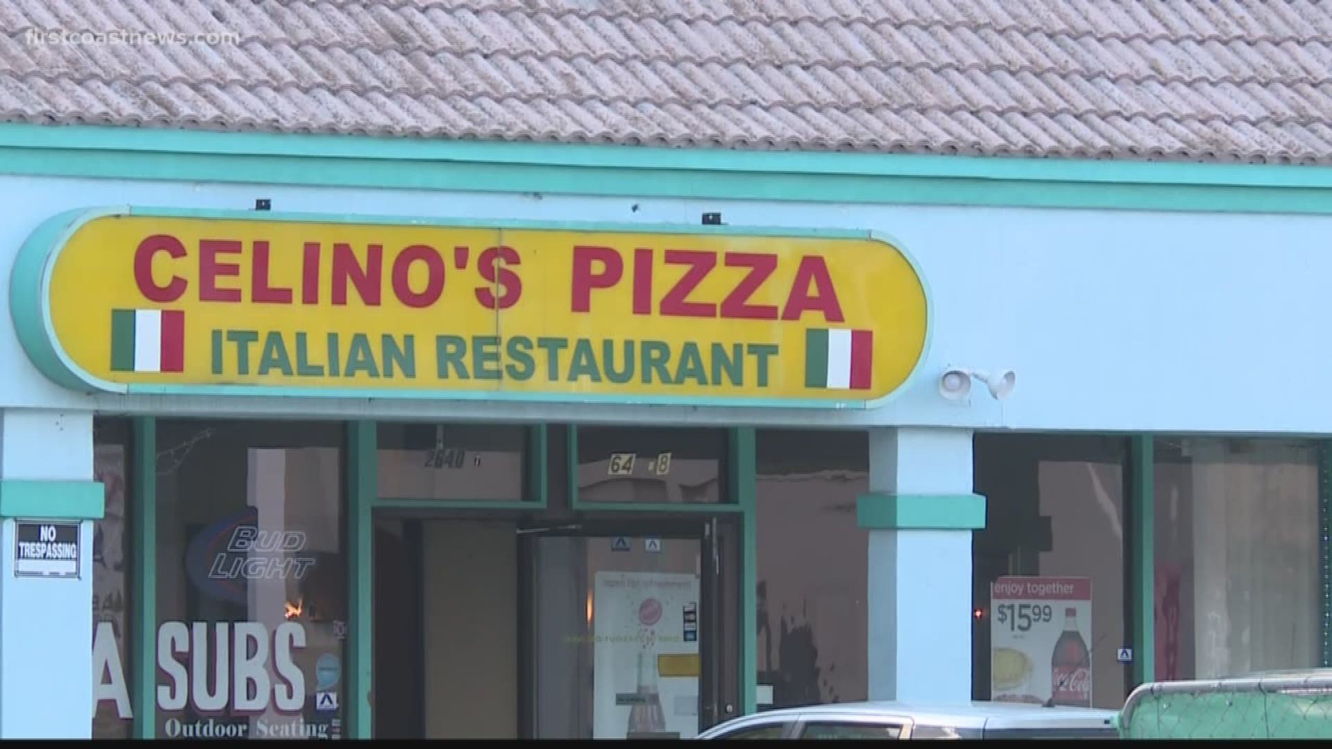 A former Arlington pizza parlor owner was arrested Sunday on fraud charges over a year of being accused of repeatedly overcharging customers.