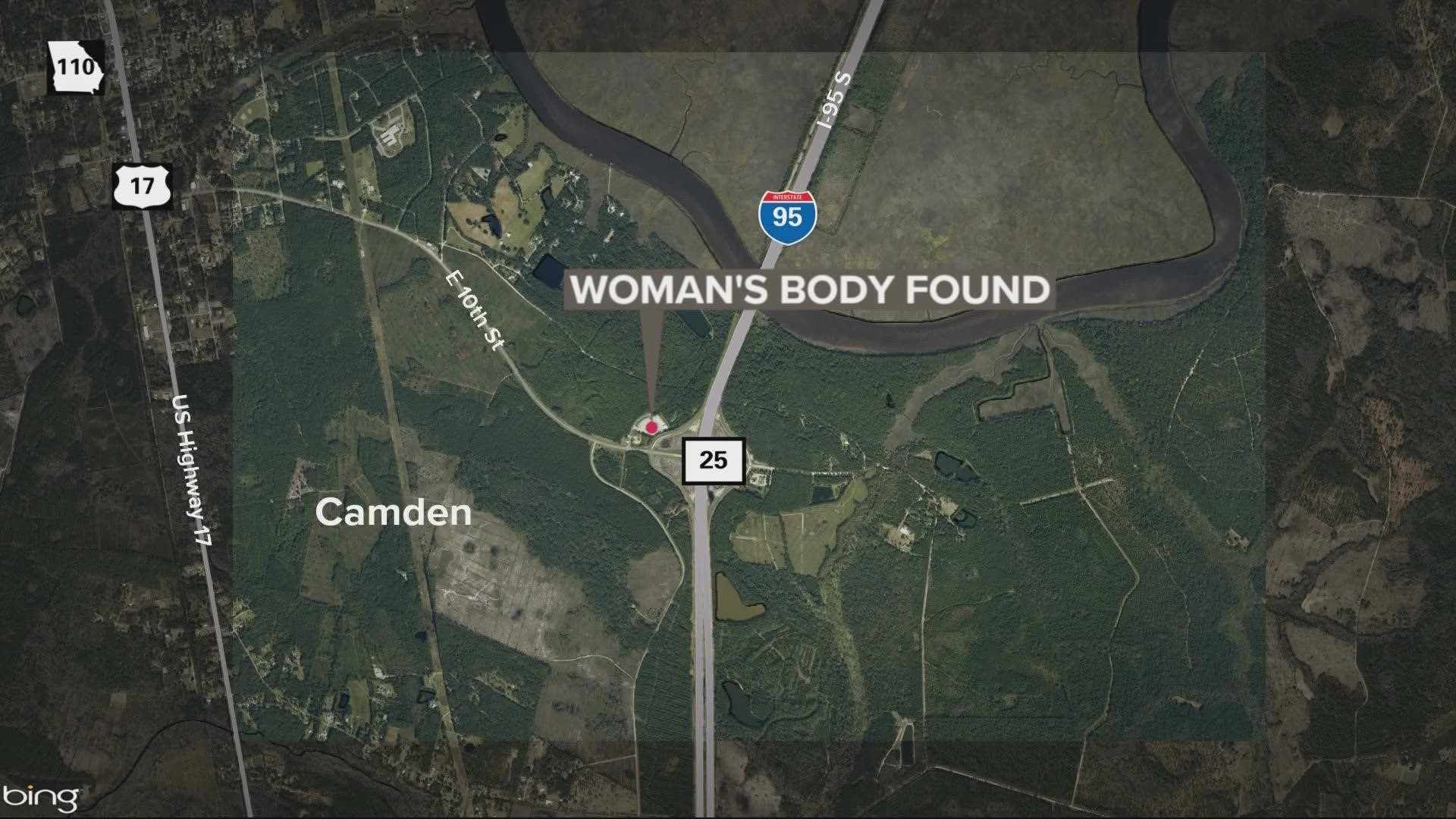 A woman was found dead near the road in Camden County, officials say.