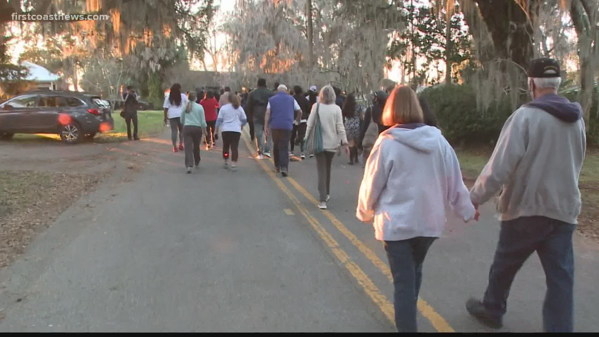 About 100 people walked the route through Satilla Shores that Arbery ran one year ago.