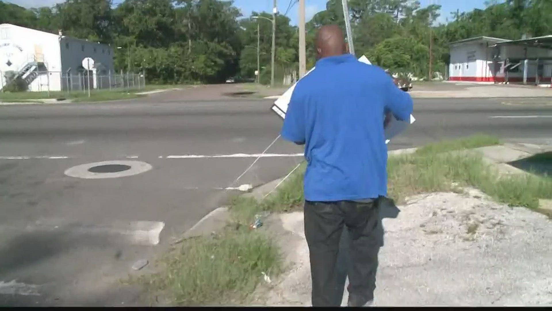 Man found dead in car on Lem Turner Road; neighbor urges others to come