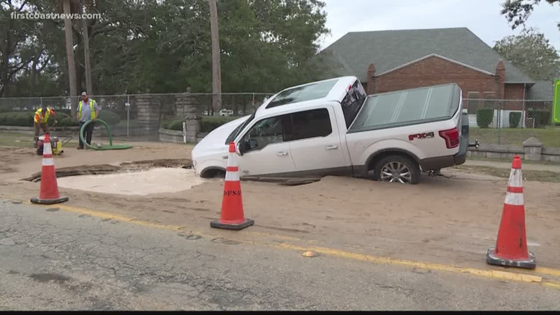 A man driving down San Marco Avenue Thursday wound up in the middle of a big hole.