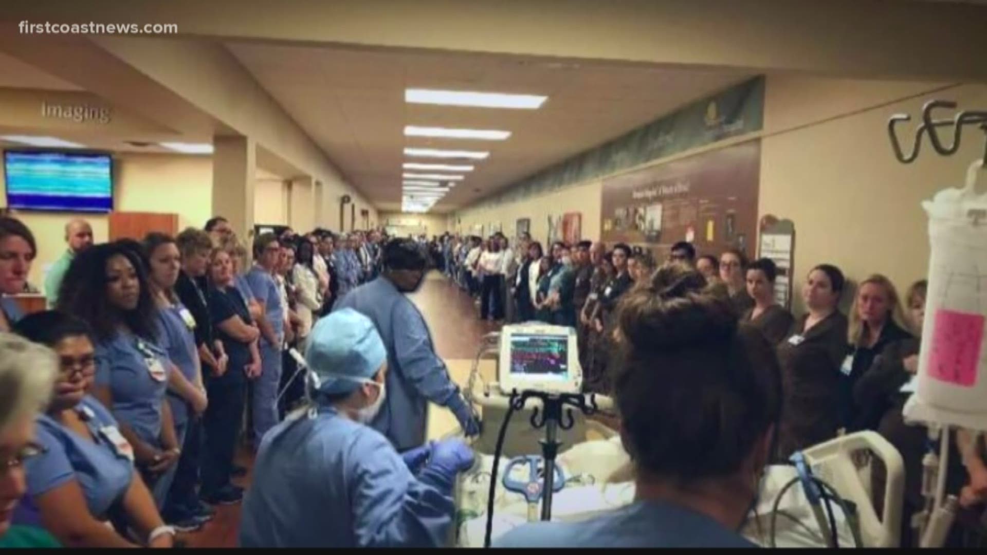 More than 100 Memorial Hospital employees lined the halls for the hospital's first Honor Walk. They paid their respects to a man whose life had ended but whose body would help others live.