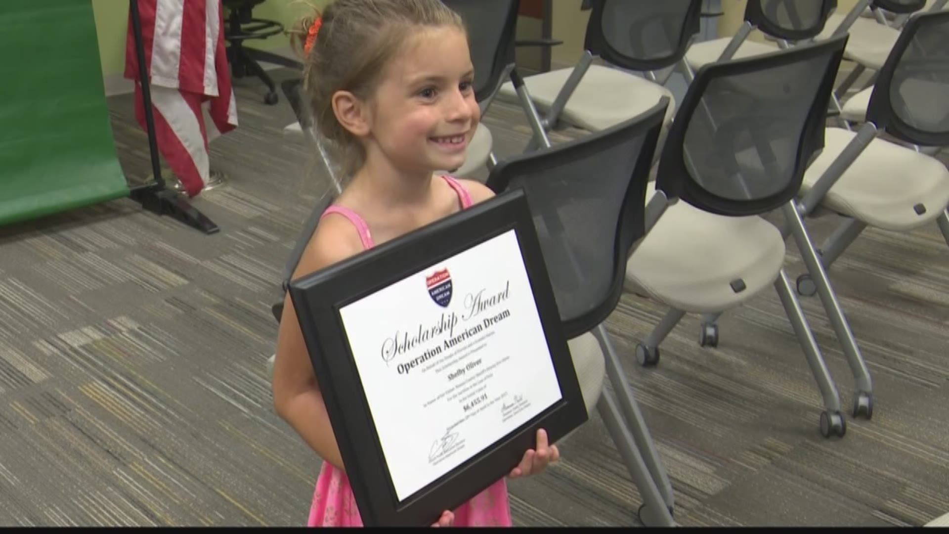 Deputy Oliver was killed in the line of duty and today his daughter was awarded a scholarship.