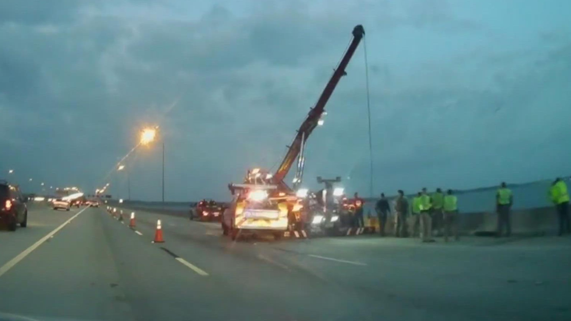 Dive teams are onsite after a car was pushed off the Buckman Bridge, officials say.