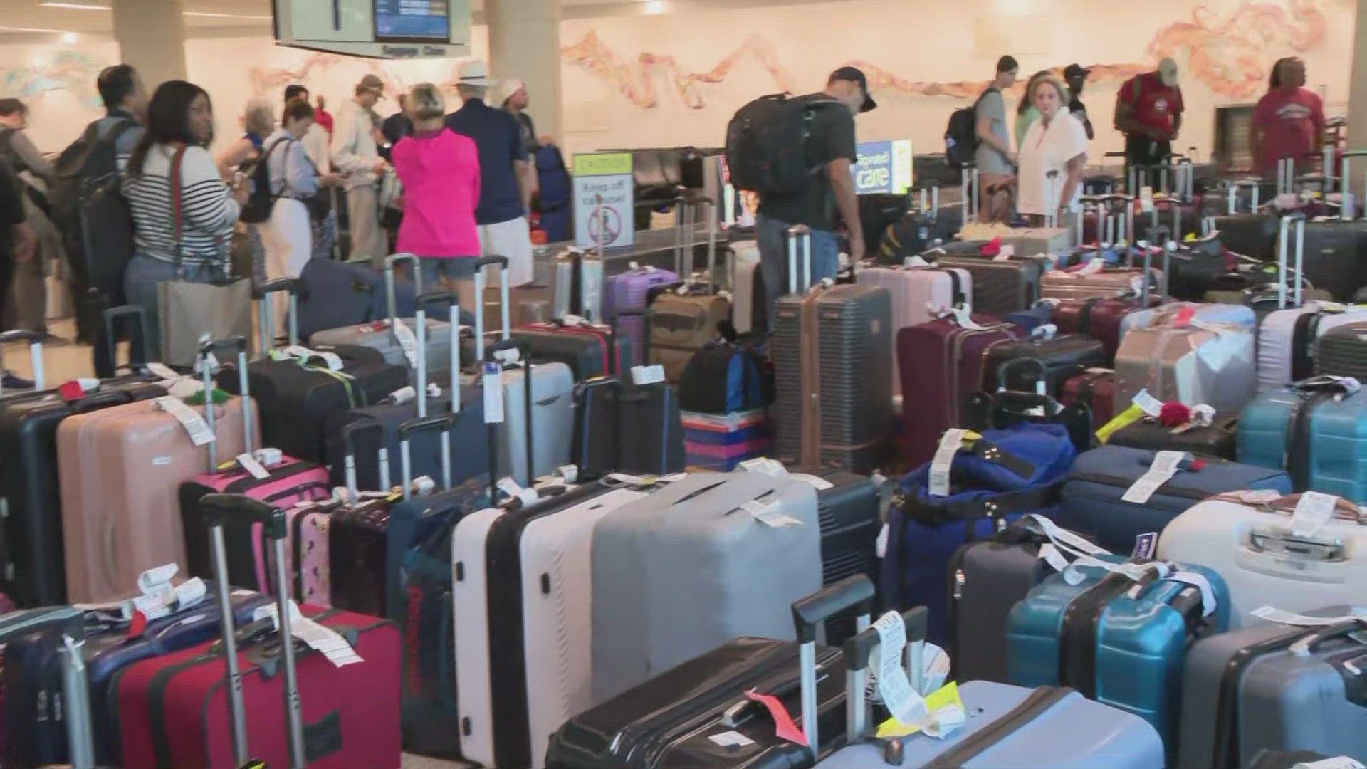 Dozens of pieces of luggage were left sitting at Delta's baggage claim at Jacksonville International Airport Tuesday following the global software outage.