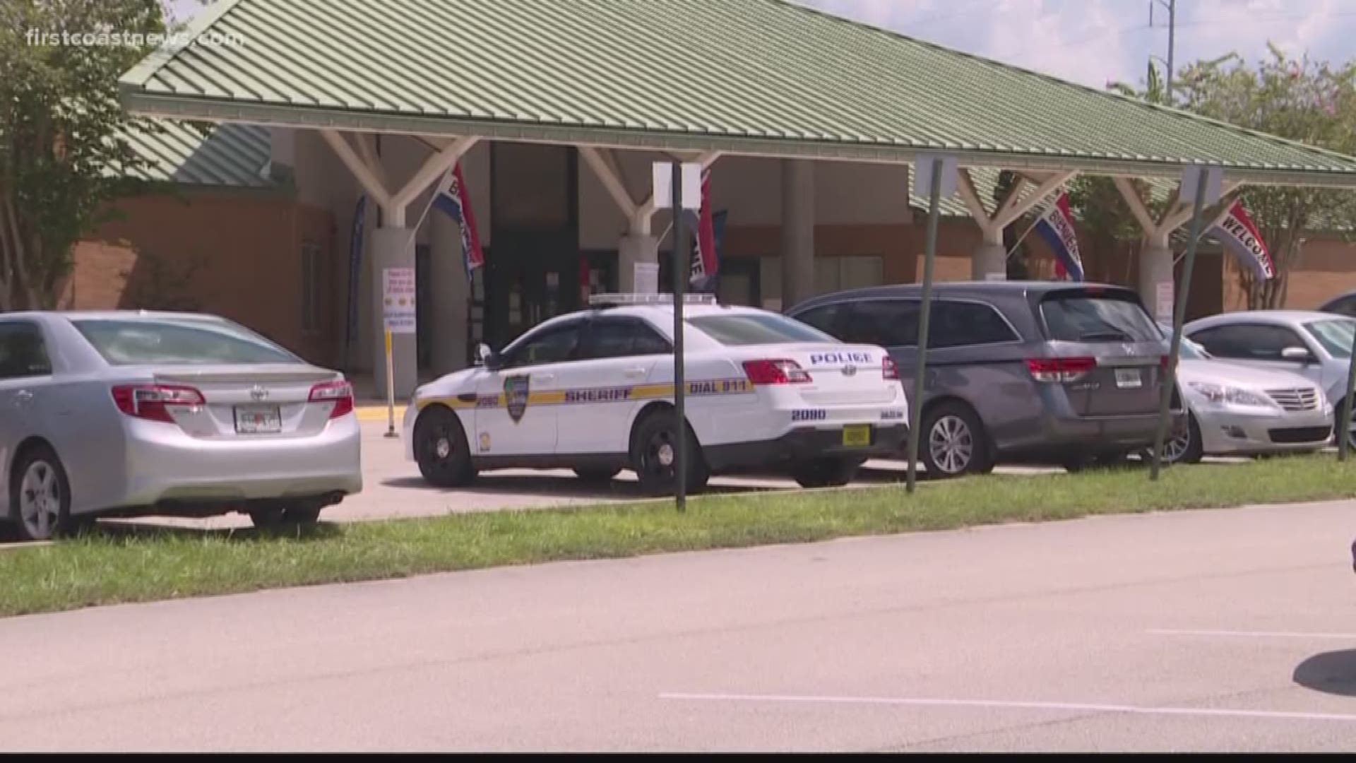A parent was arrested Friday after he walked into Beauclerc Elementary with a concealed gun on his hip, according to the Jacksonville Sheriff's Office.