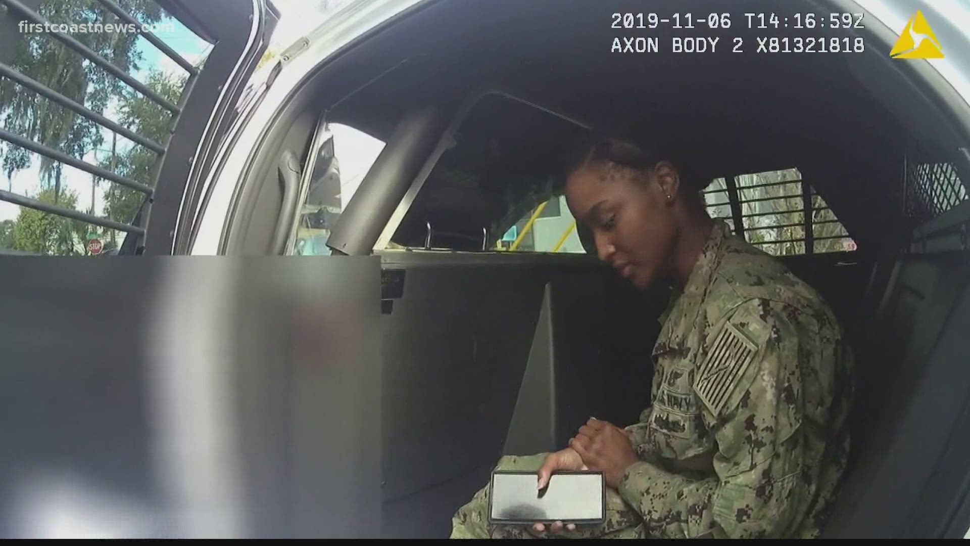 The video shows Taylor Williams' mother Brianna being interviewed in the back of a police car as officers were doing a door-to-door search for the 5-year-old girl.