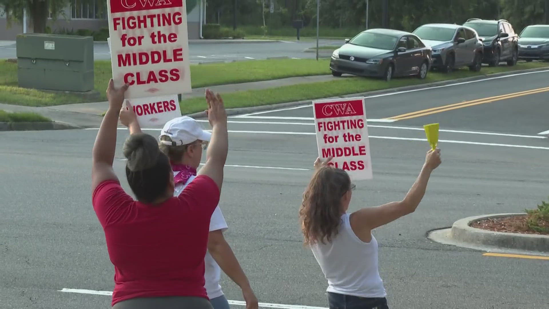 About 100 AT&T employees in Fleming Island were striking Saturday over what they call unfair labor practices.