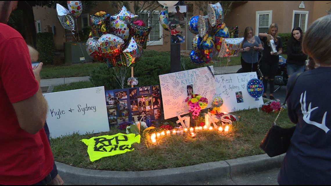 Couple shot, killed in parking lot remembered with vigil ...