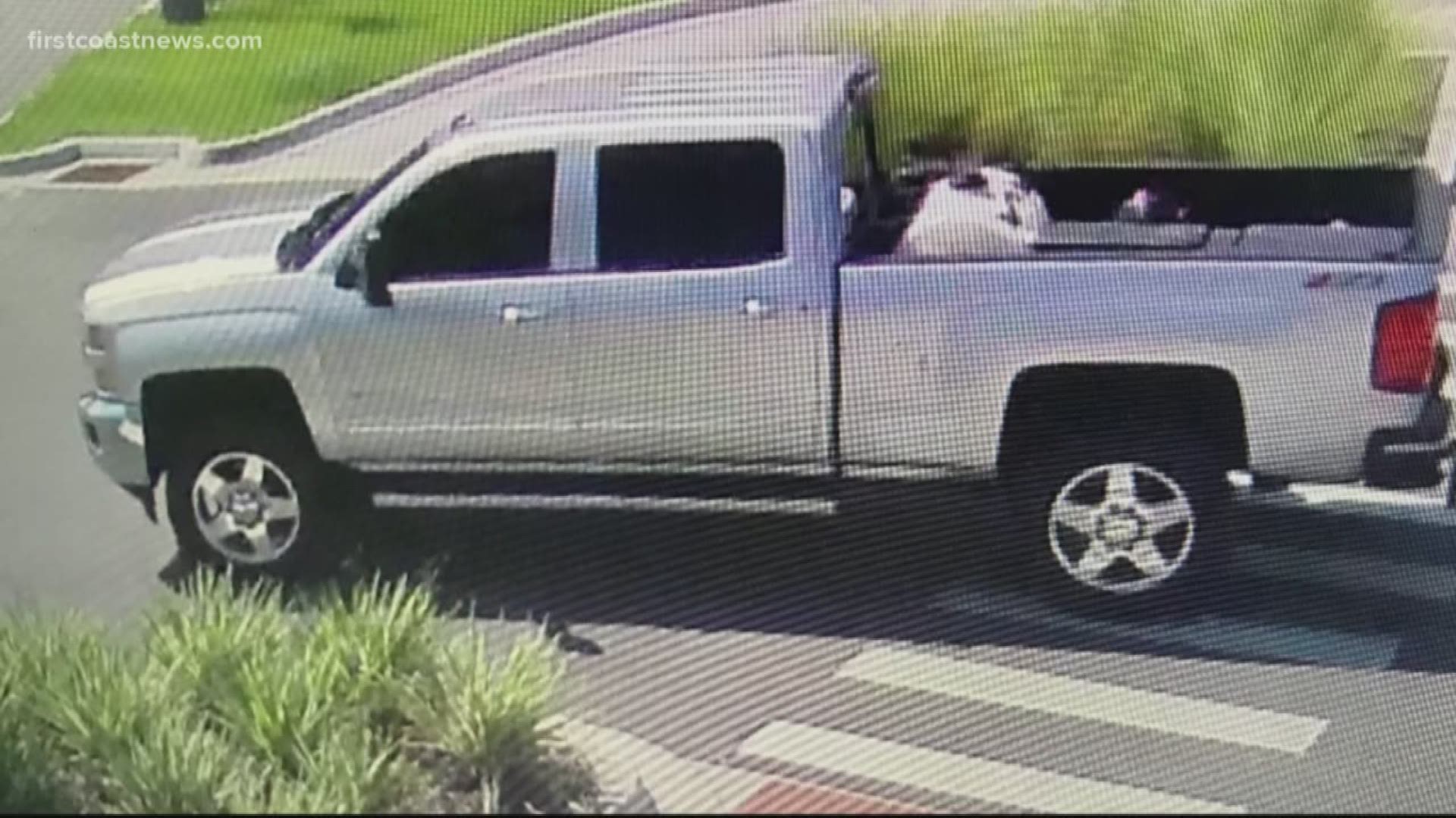 The St. Johns County Sheriff's Office is searching for a man who witnesses say took off in this truck after dragging a female with him.