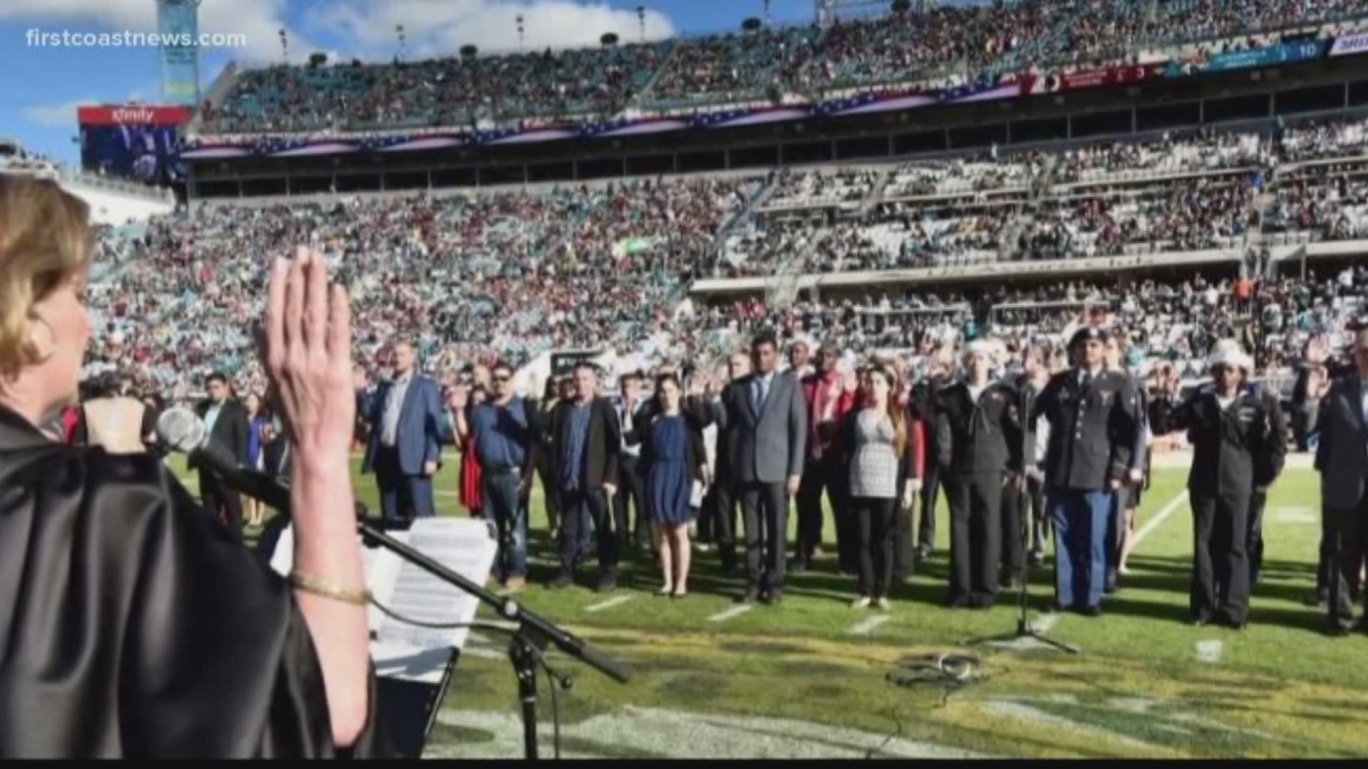 65 people from almost 40 countries became citizens during the Sunday's Jaguars vs Redskins game.