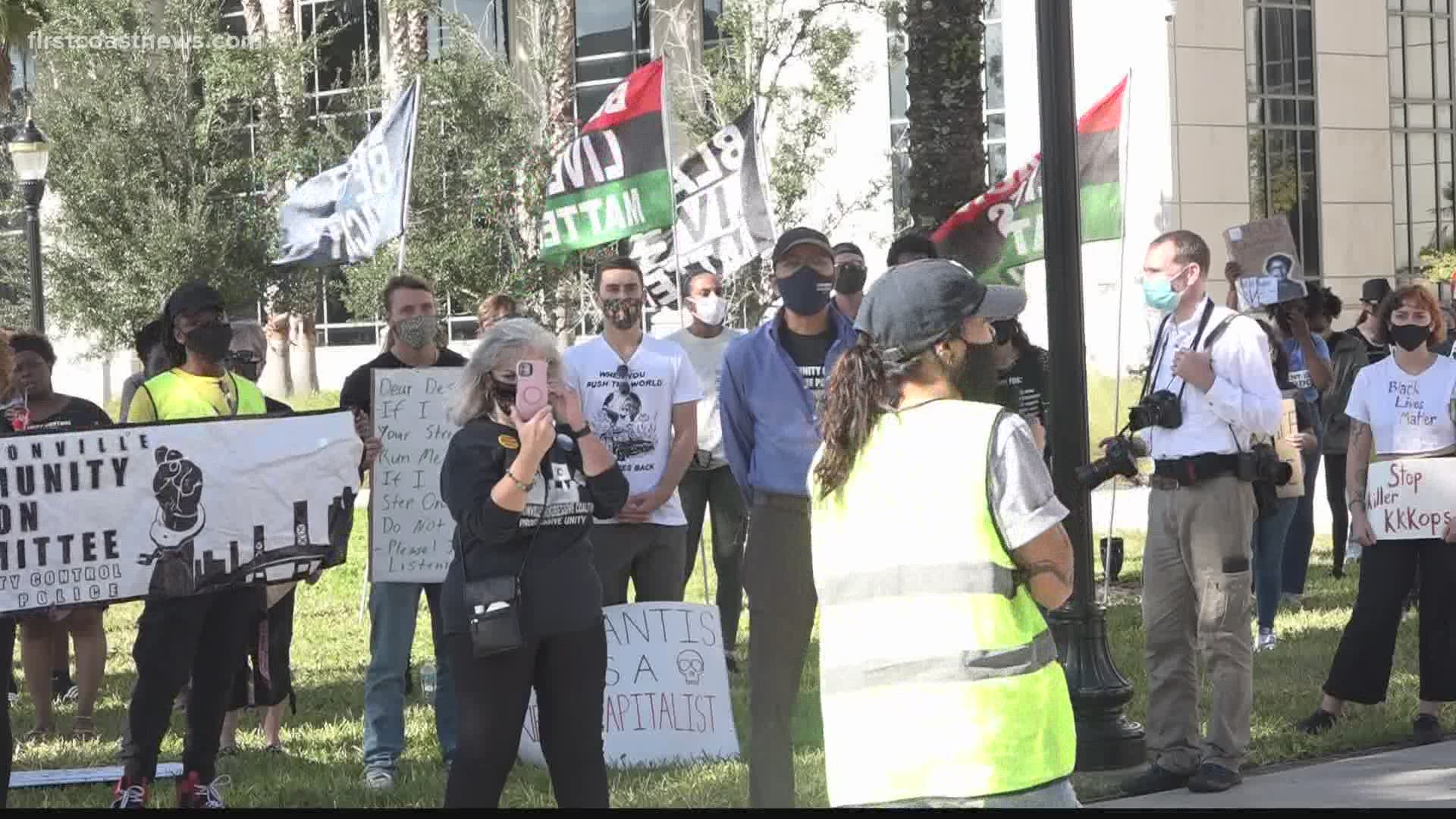 Activists rally in Downtown Jacksonville against Florida Gov. Ron DeSantis' 'anti-mob' proposal