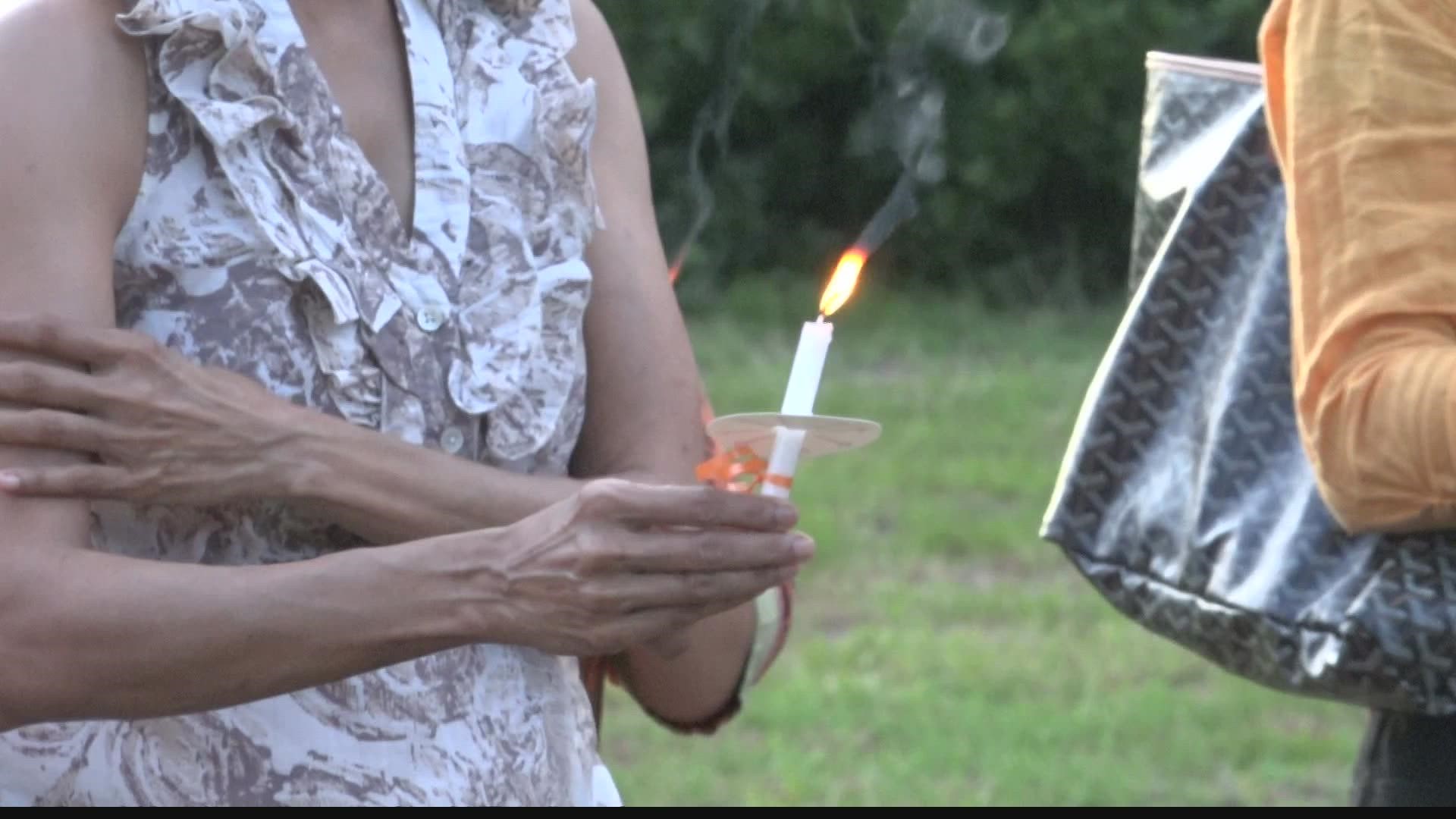 Organizers held the vigil at Davis Park to reflect on the shootings in Buffalo, New York and Uvalde, Texas.