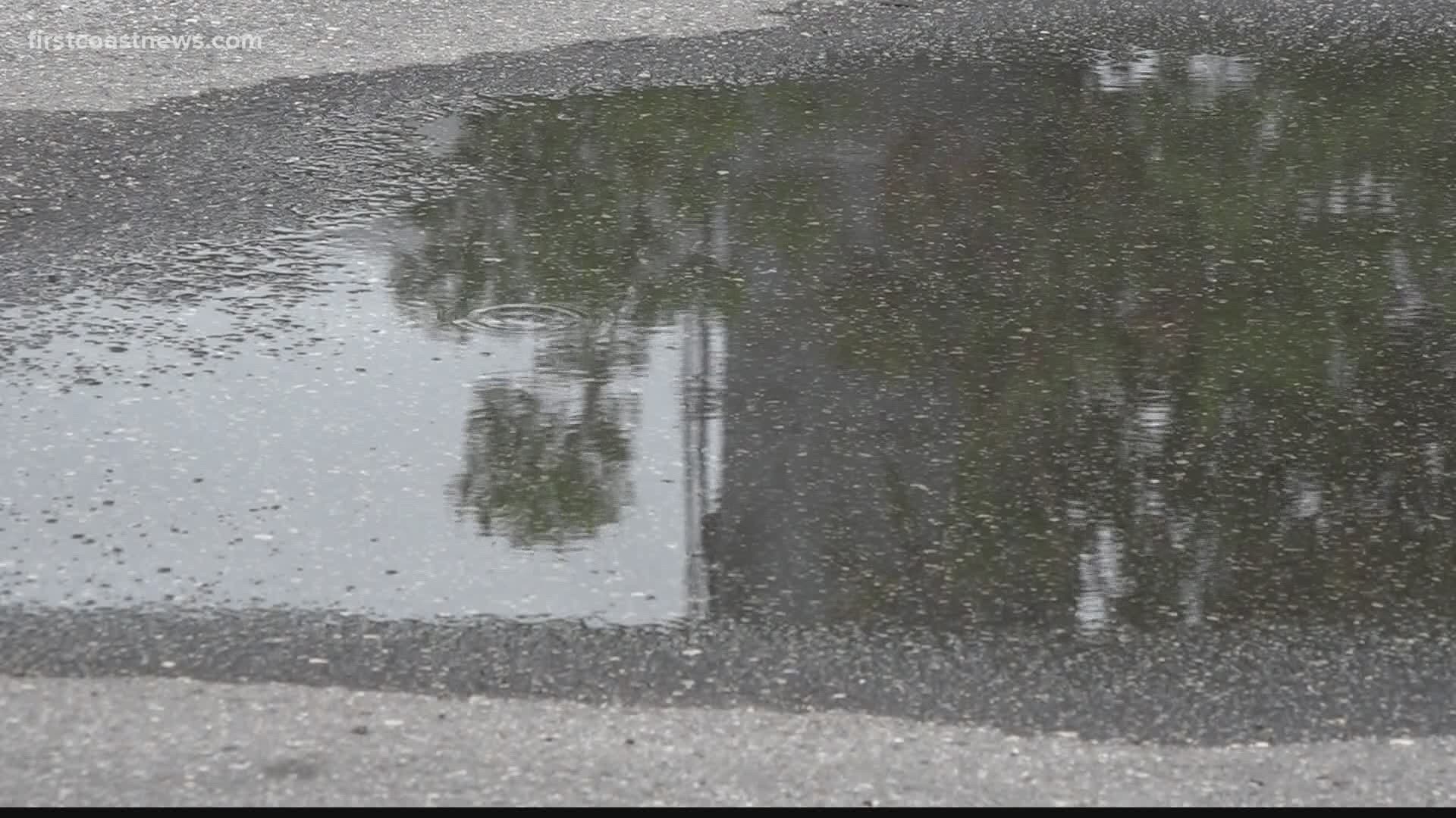 As 4th of July celebrations went on inside Sherwood's Bar on San Marco, floodwaters invaded the small business.