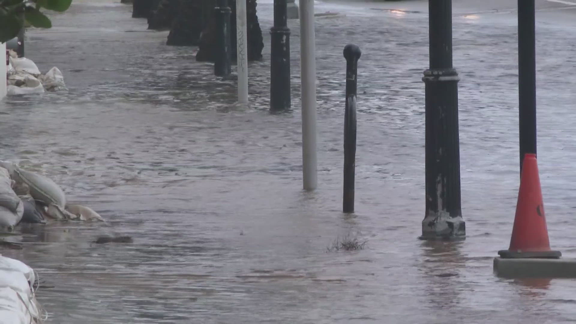 Much of the flooding downtown receded after the evening's high tide, reopening the Bridge of Lions. Rivers returned to streets and ponds returned to parking lots.