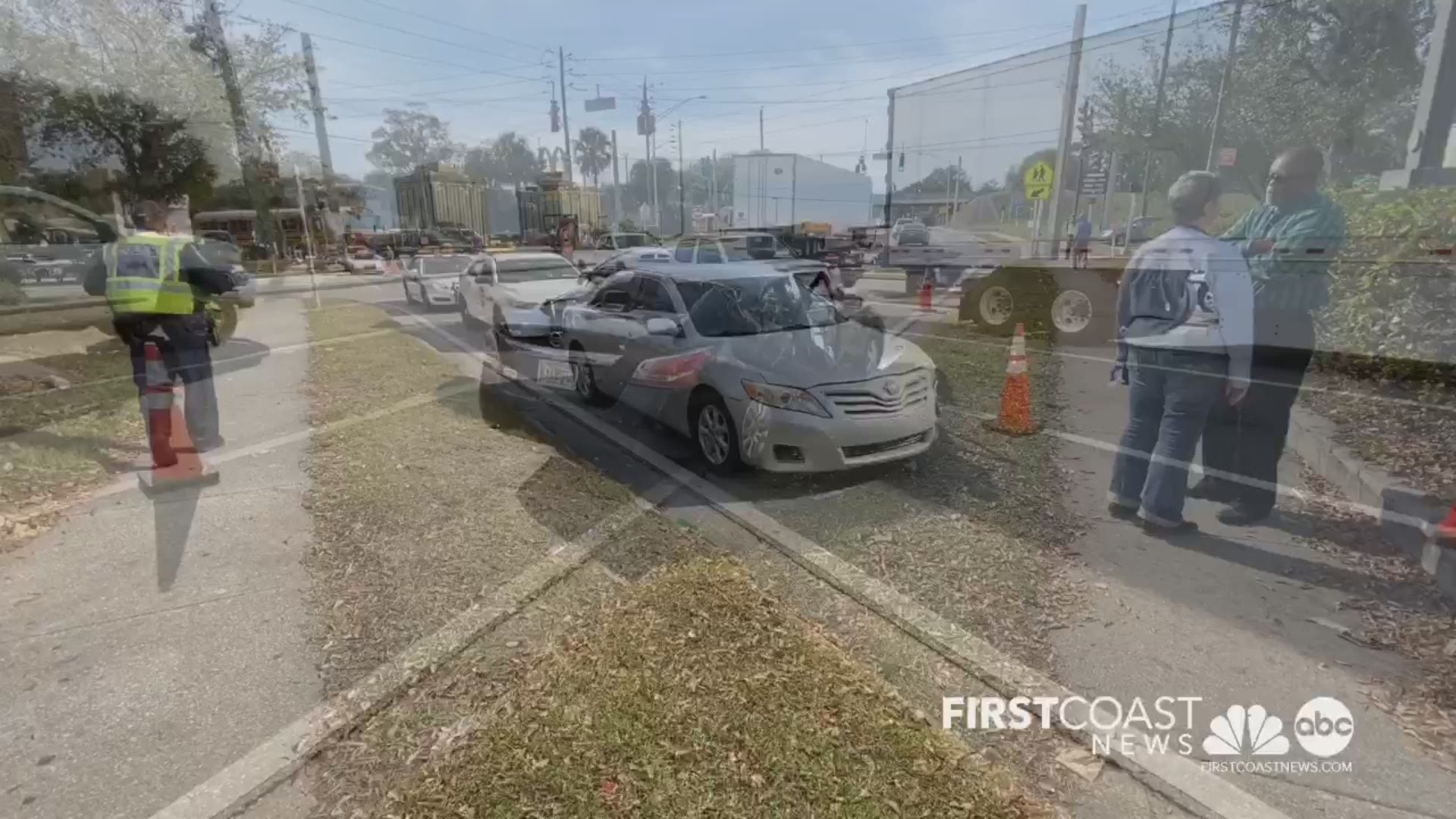 The crash happened on North Davis Street and 8th Street West. Officers at the scene told First Coast News one person was trapped in a car.