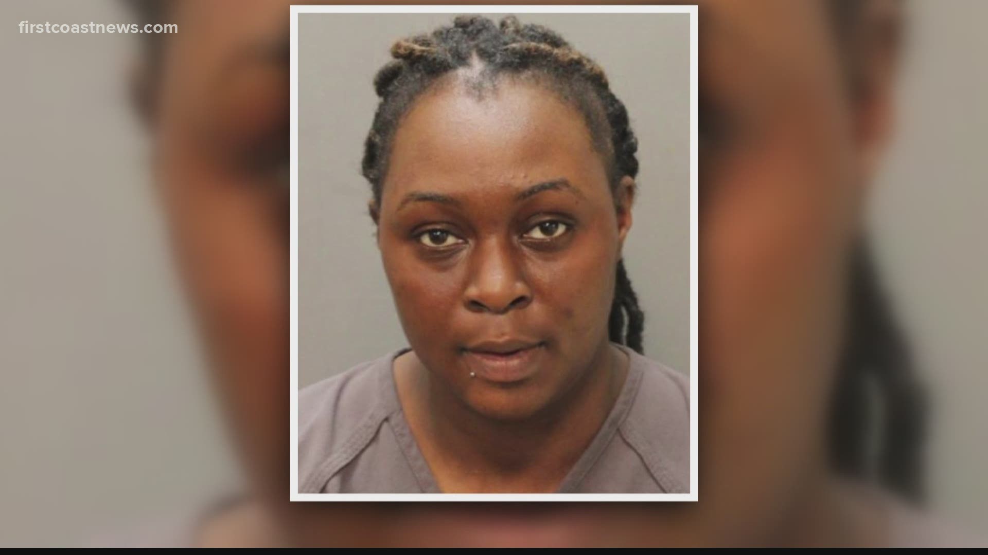 Moenika Ellis was arrested Tuesday at Matthew Gilbert Middle School. Police say she had a 9mm pistol, as well as marijuana.