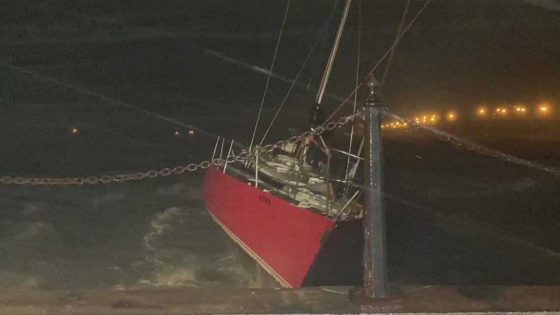 Loose sailboat slams into St. Augustine seawall during Tropical Storm Ian