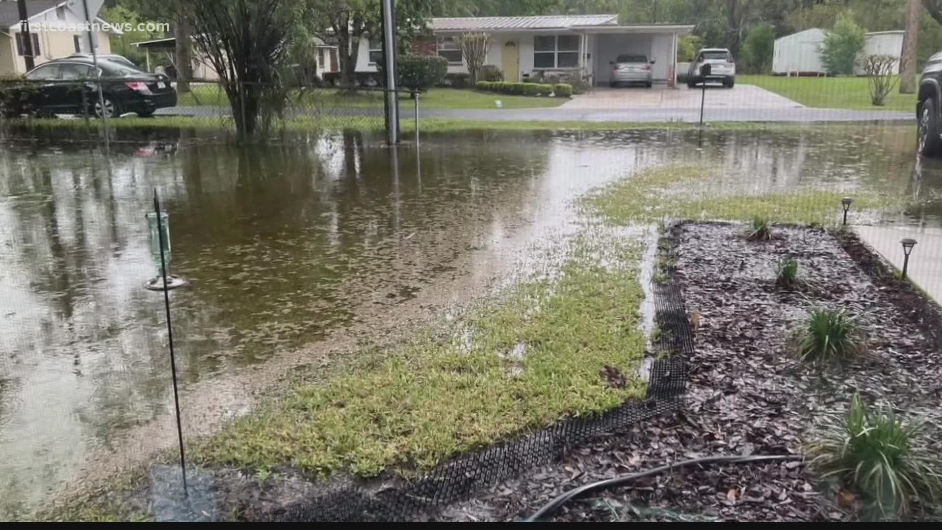 Every time it rains in Murray Hill, the driveway and front yard become a pond. City officials say the newly constructed house did not address drainage issues.