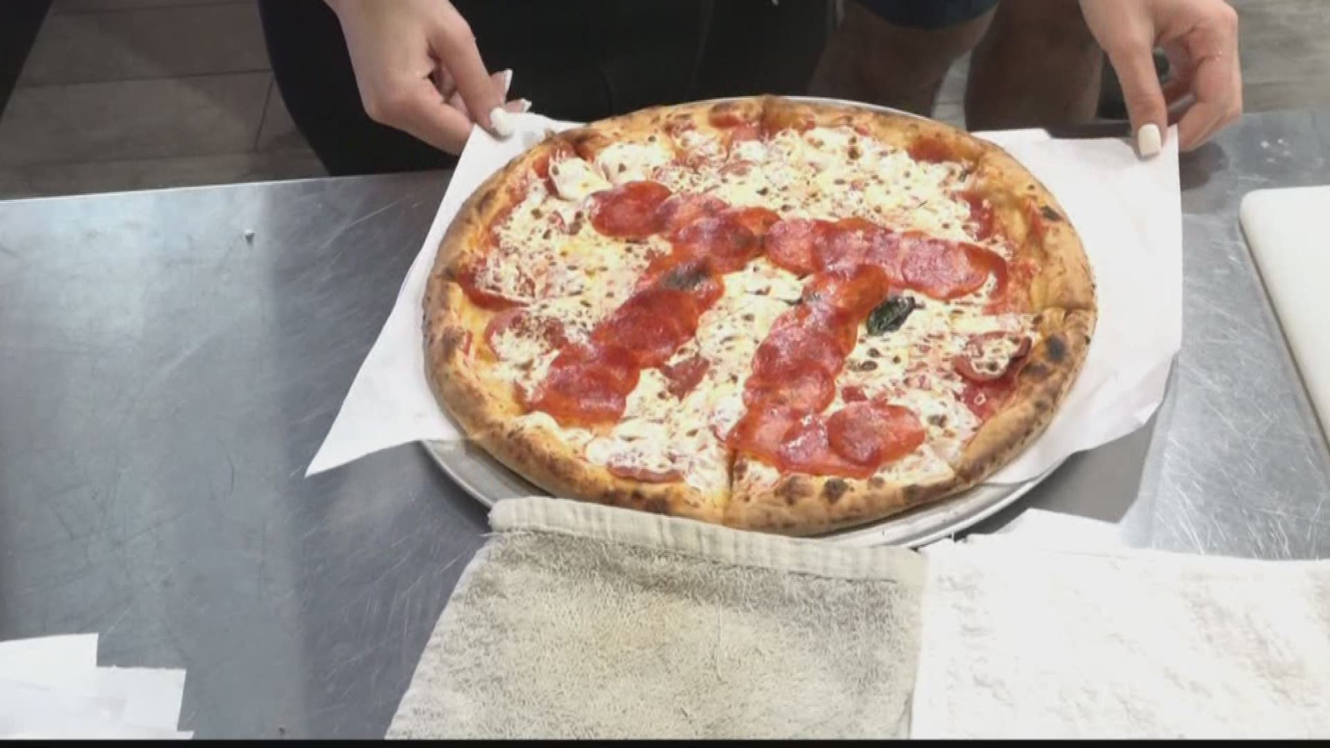 Watch Haddie Djemal celebrate National Pi Day by making a pizza pie at Fired Up Pizza in Murray Hill