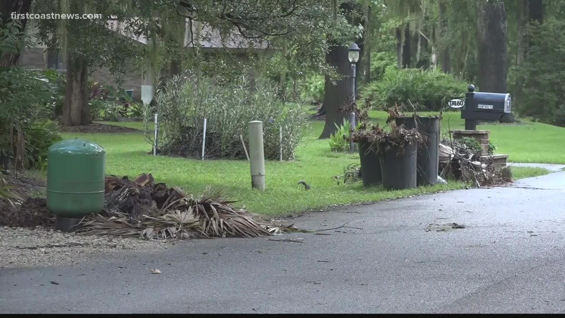 As yard debris pile up around many Jacksonville neighborhoods, Mayor Lenny Curry said Wednesday he wants to suspend recycling to deal with it.