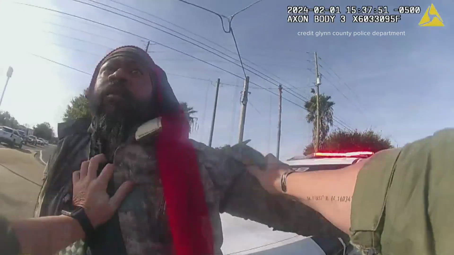 The body camera video shows Stanley Jackson confronted by a Glynn County police officer along a Brunswick road.