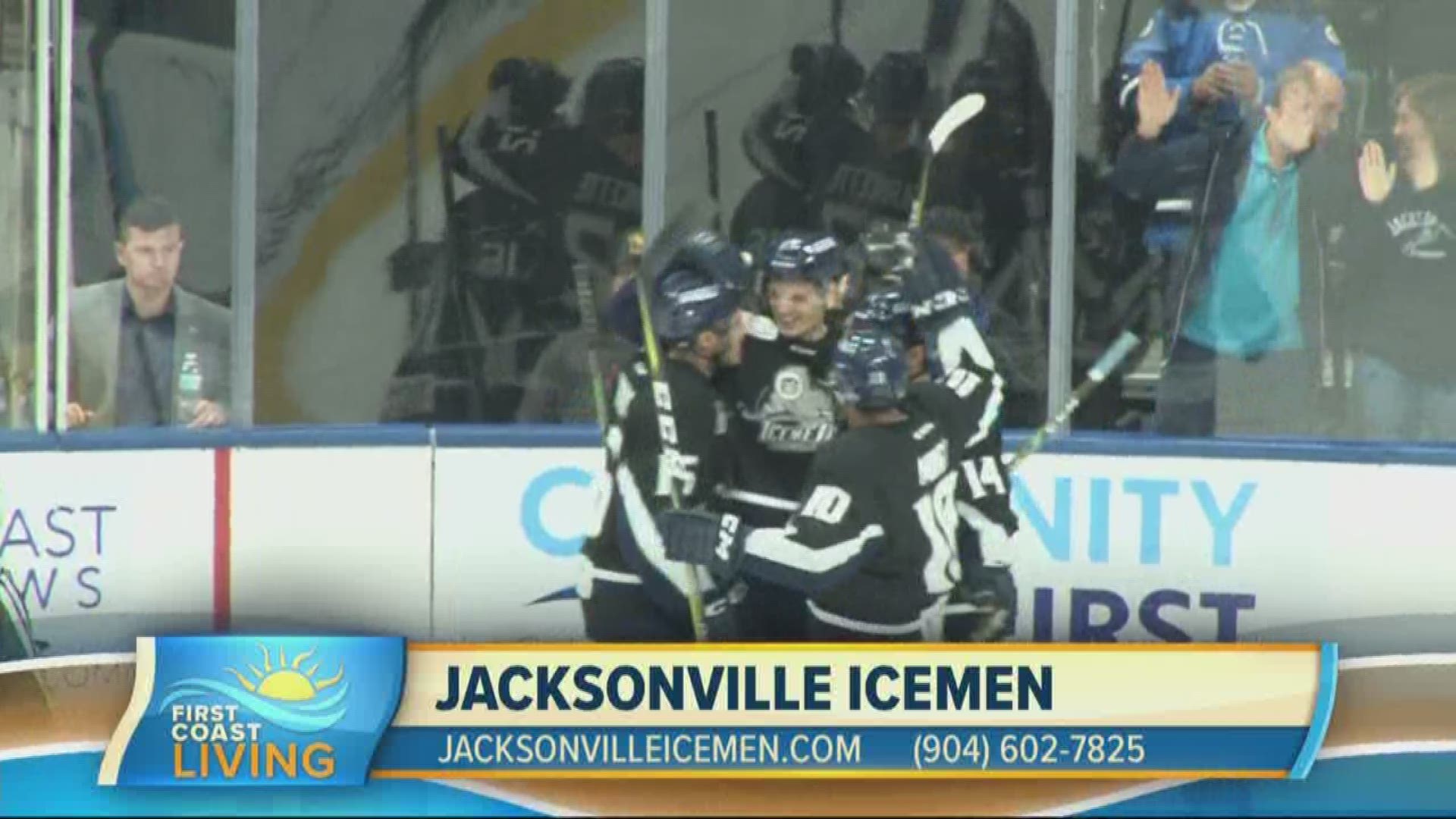 Haddie Djemal and Curtis Dvorak sit with Jacksonville Icemen President Bob Ohrablo as he gives details on the Jax Eats Food Festival happening as they take on the Orlando Solar Bears.