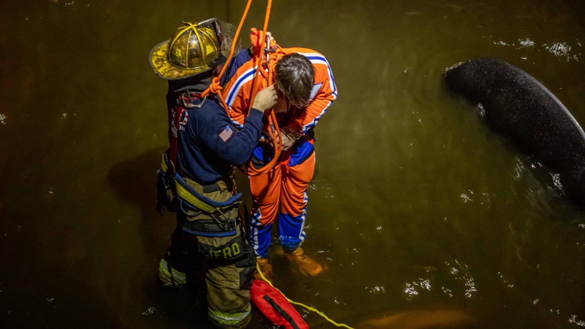 PHOTOS: Florida firefighters rescue man after car goes off bridge - Vimarsana News