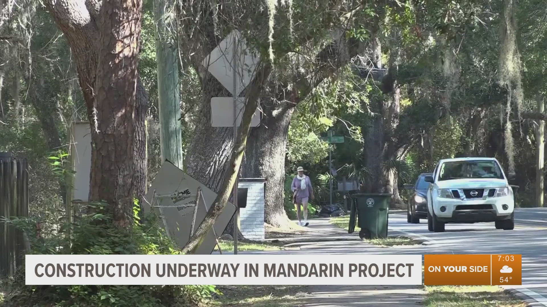 Councilman Michael Boylan says the project along Mandarin Road aims to make the road safe for pedestrians, while neighbors say the oak trees should be preserved.