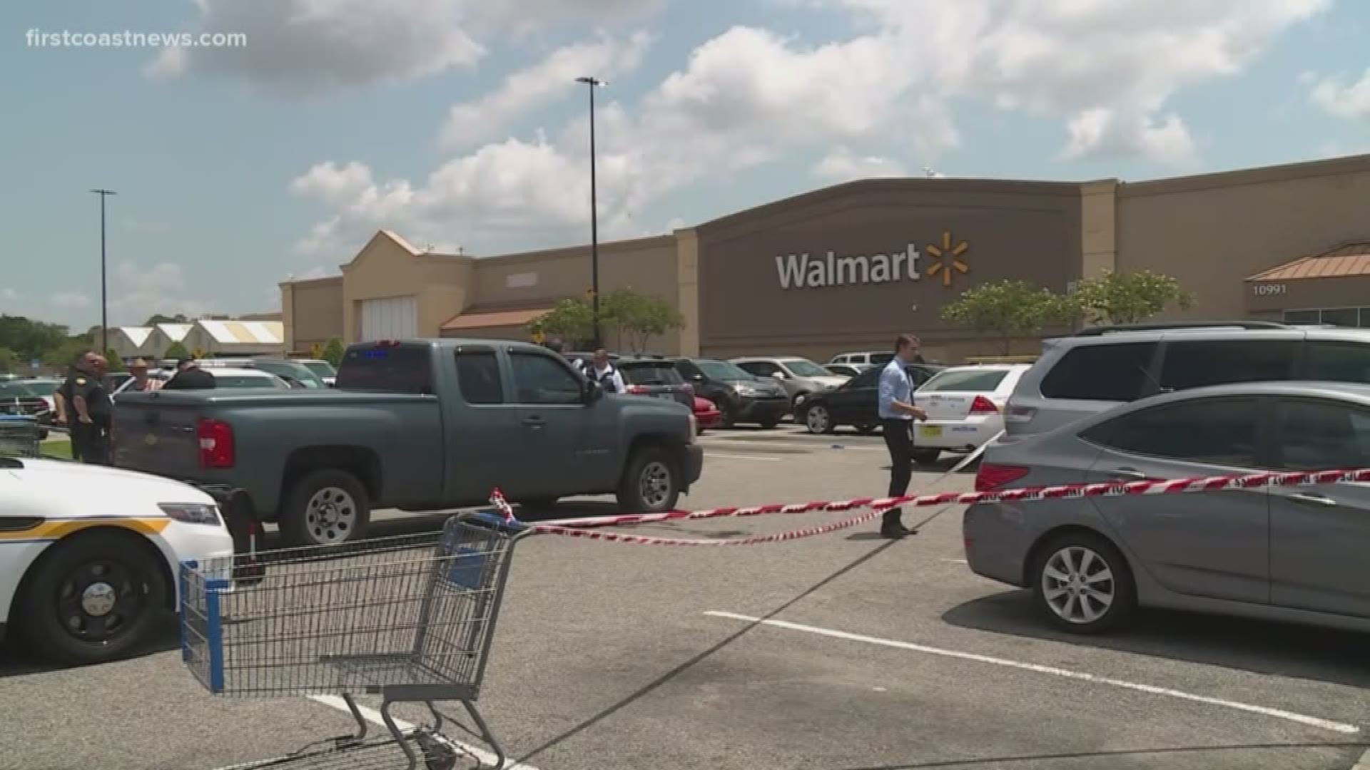 A pedestrian is in serious condition after they were run over and pinned under a vehicle in a Walmart parking lot.