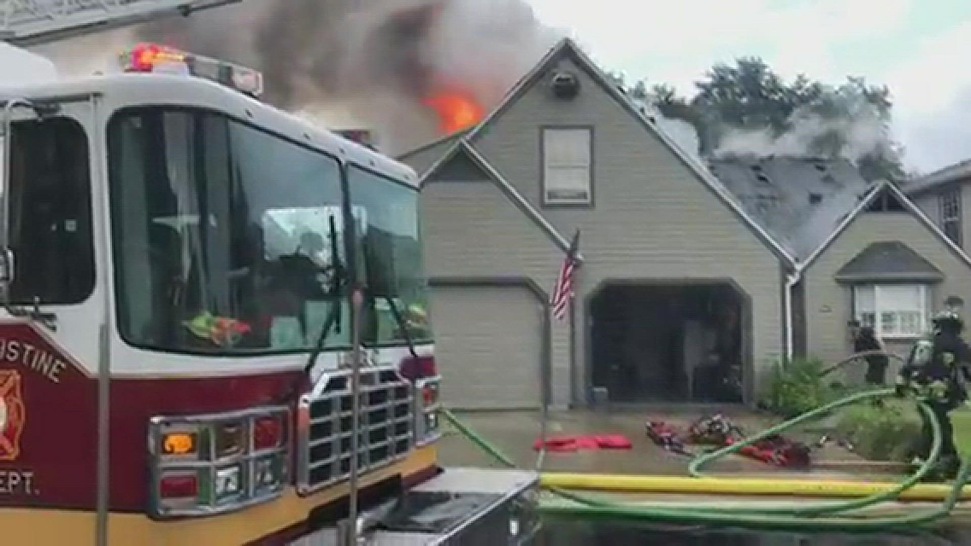 A fire rose out of a house at Vilano Beach Saturday. Neighbors said it may have been from a lightning strike.
Credit: Glen