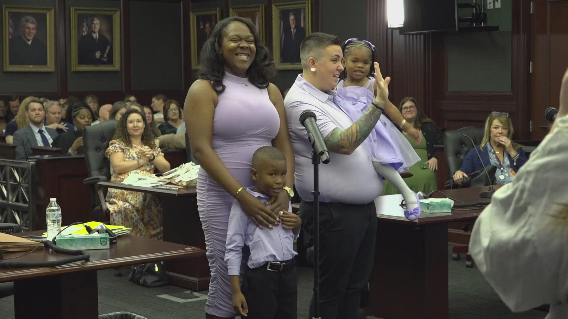 18 children found permanent homes during a special Adoption Day ceremony in Jacksonville, marking National Adoption Month. One adoption reunited two young siblings.
