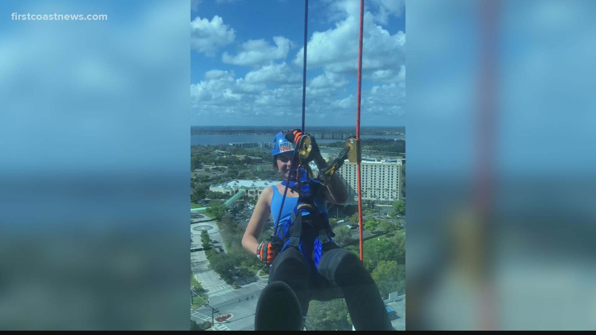 Amelia Acuff rappelled a 32 story building as a way to raise funds for a non-profit.