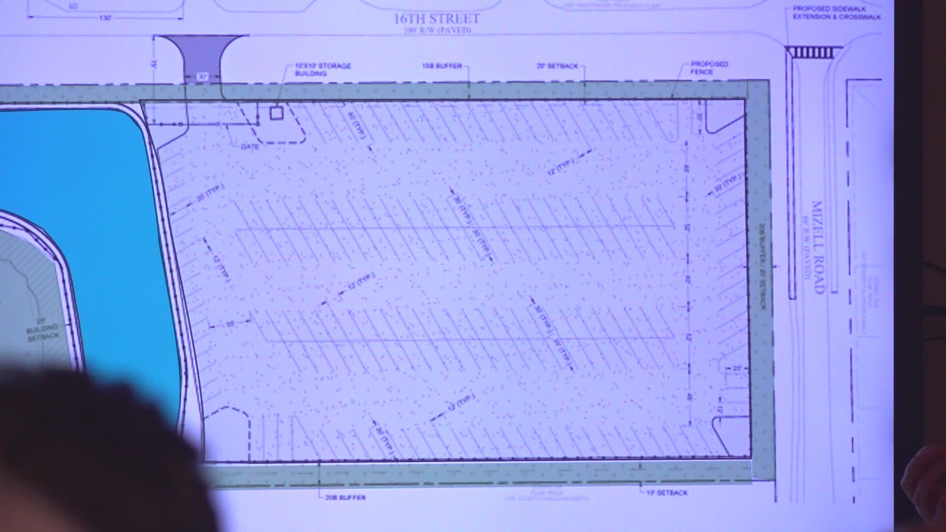 The developer hosted a public meeting to discuss the proposal with neighbors. The 10-acre site is near three neighborhoods and a bird sanctuary.