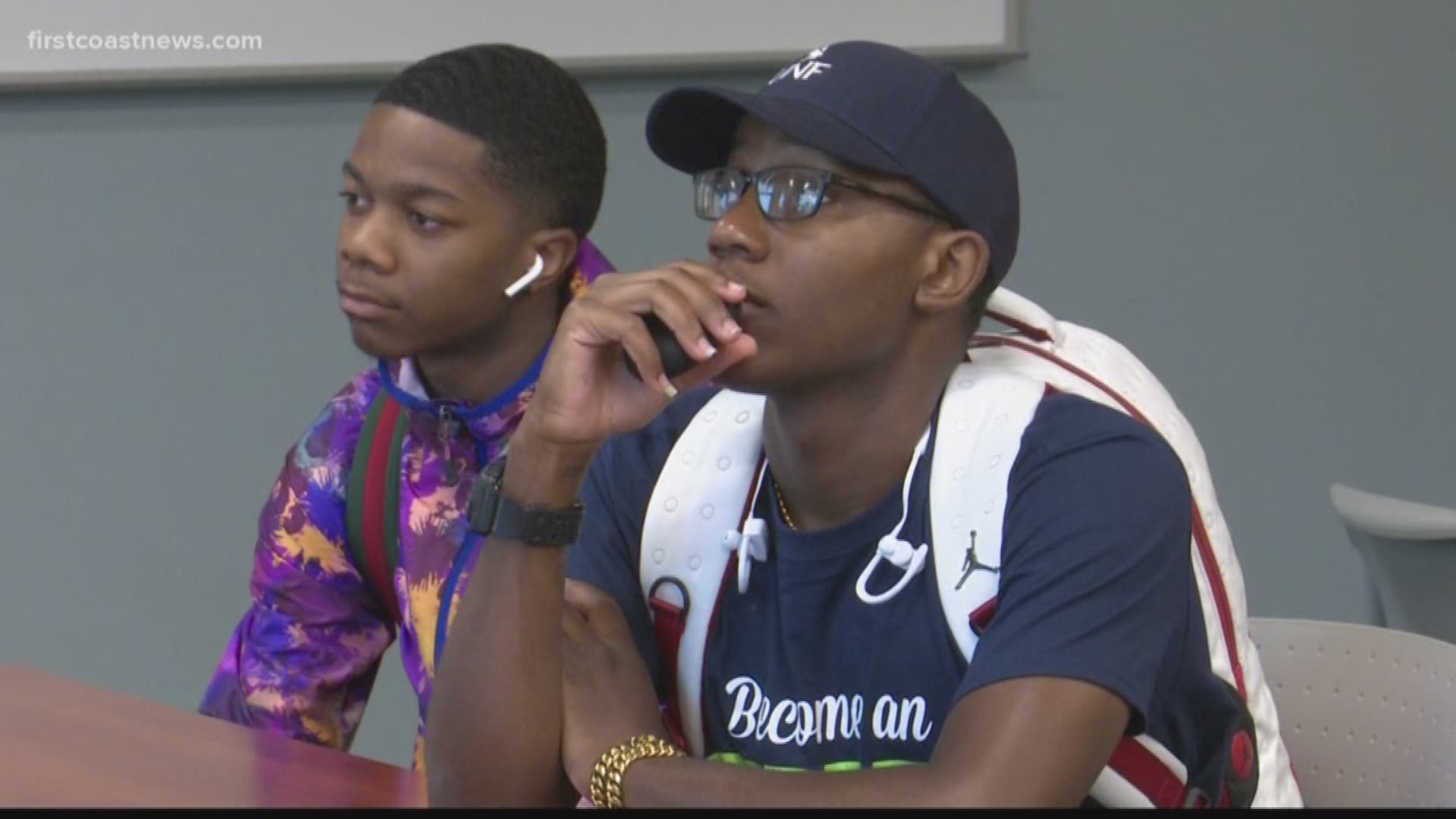 The University of North Florida has offered eight young men of color a scholarship to pursue careers in education. Monday, they got something else to help them reach their goals.
