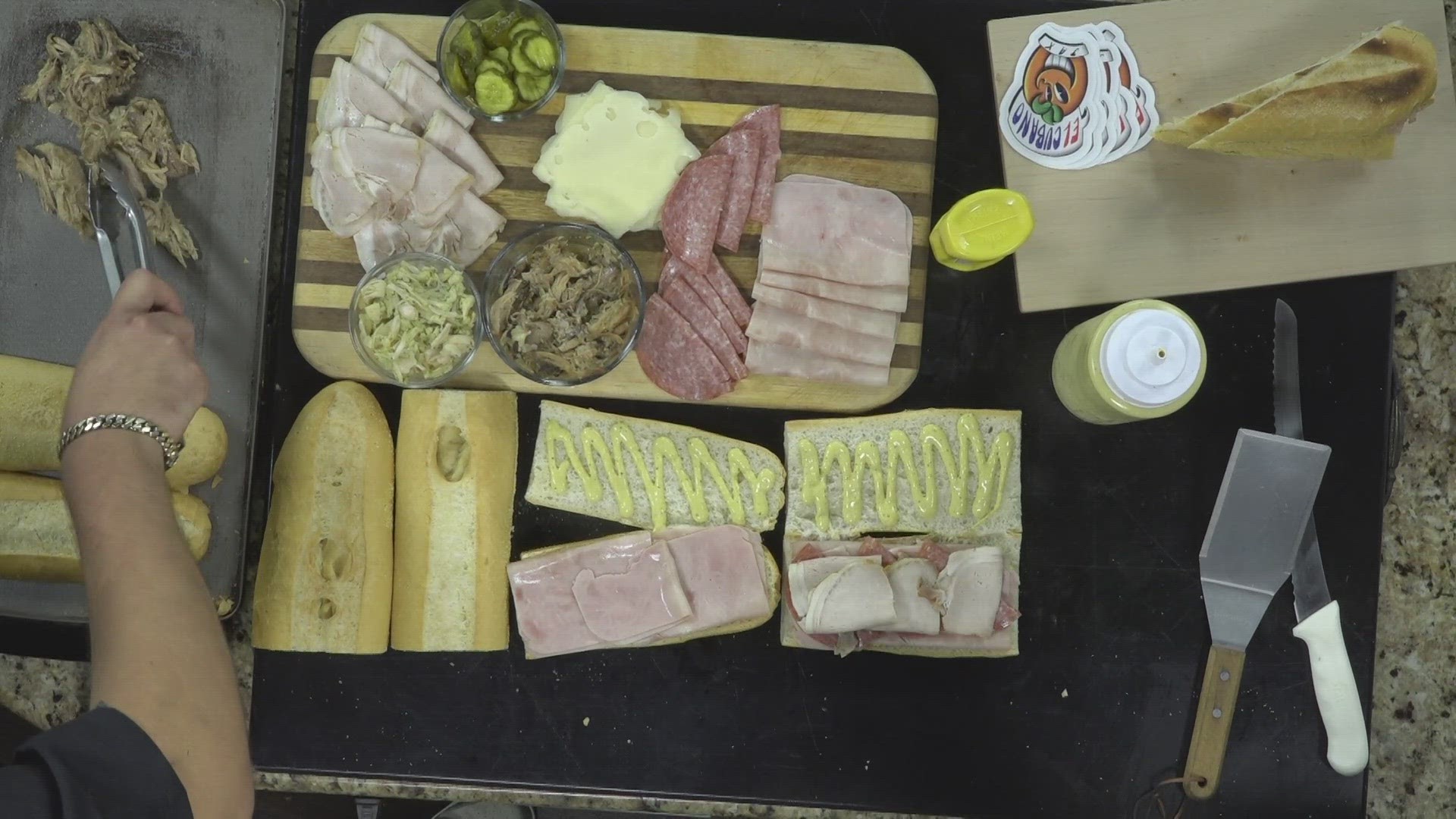 Chef Estaban of El Cubano Jax, located at Lemon Street Brewing Co. in Jacksonville, talks the difference between a Tampa and Miami Cuban sandwich while cooking both.