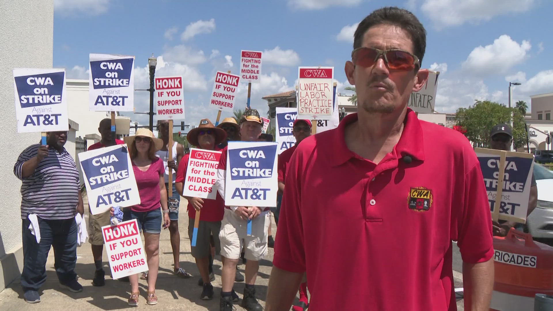 The workers are part of the Communications Workers of America Union and are accusing AT&T of unfair labor practices during negotiations for a new contract.