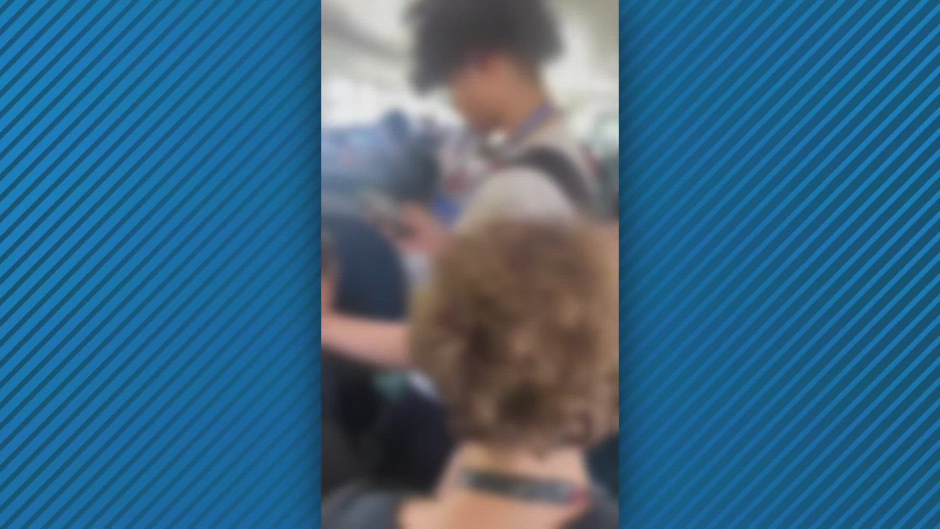 A video shows some Stanton students had to stand in the aisle and sit on the floor of the bus.